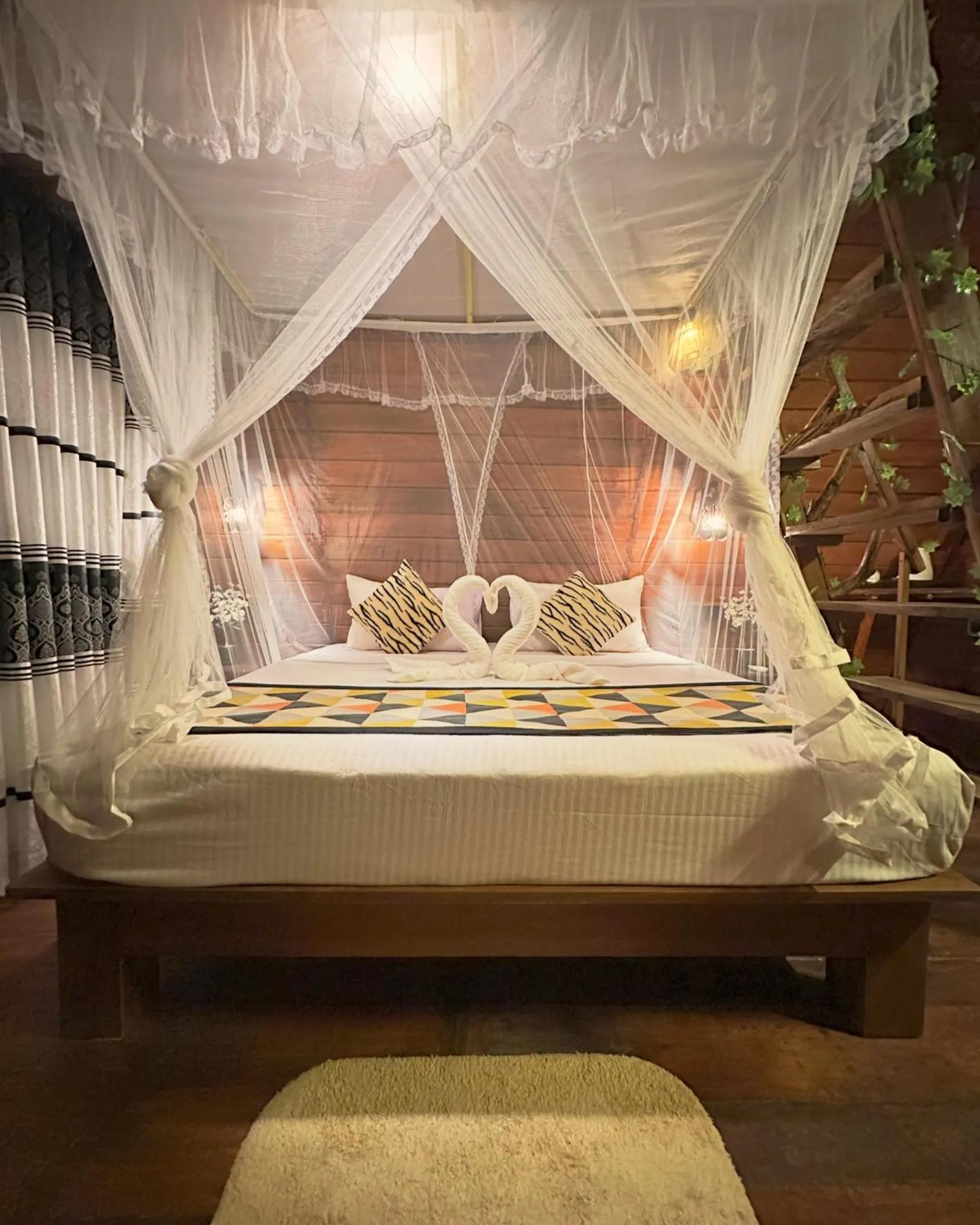 Bed in Levona Garden Resort