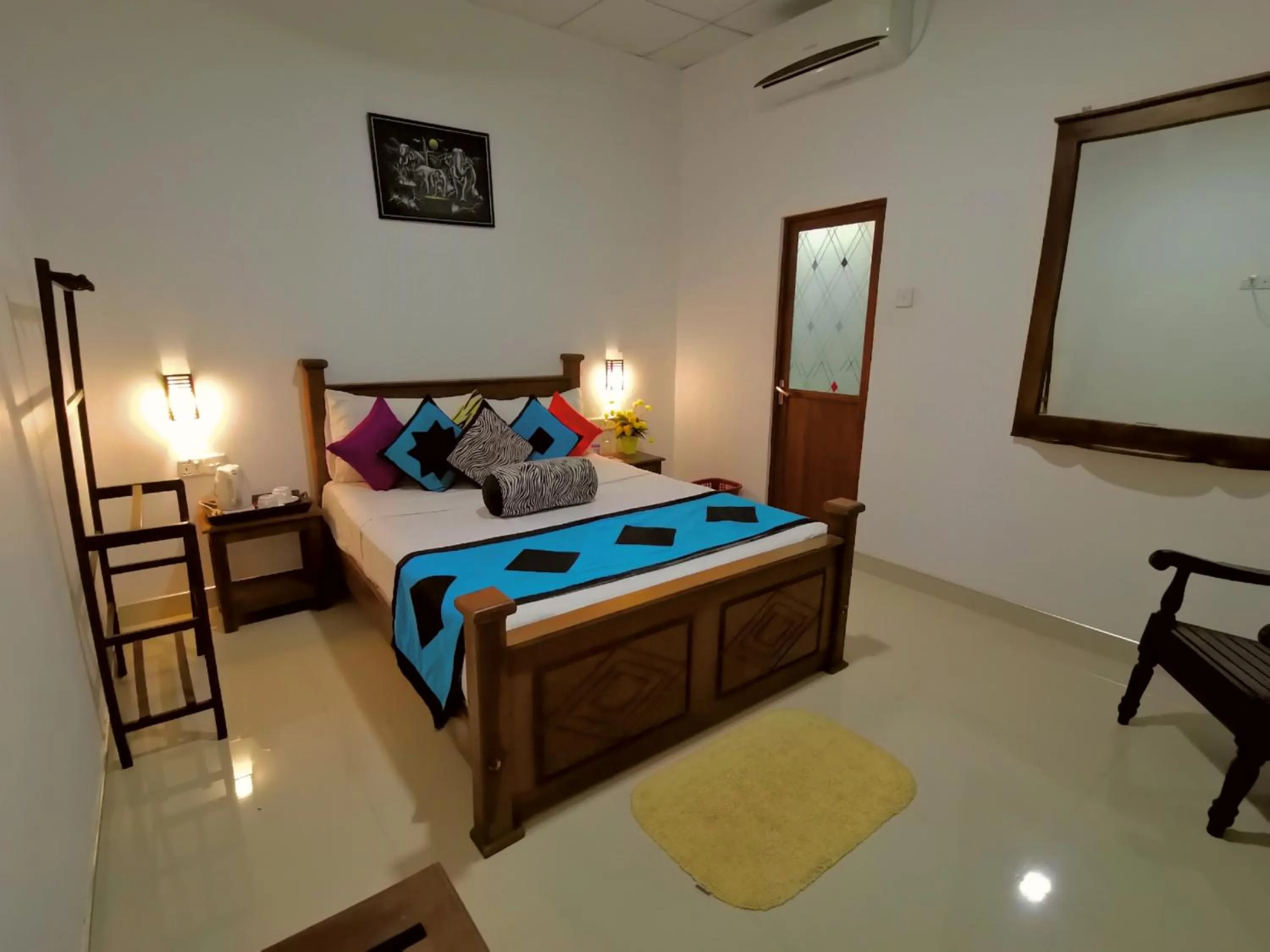 Bed in Levona Garden Resort