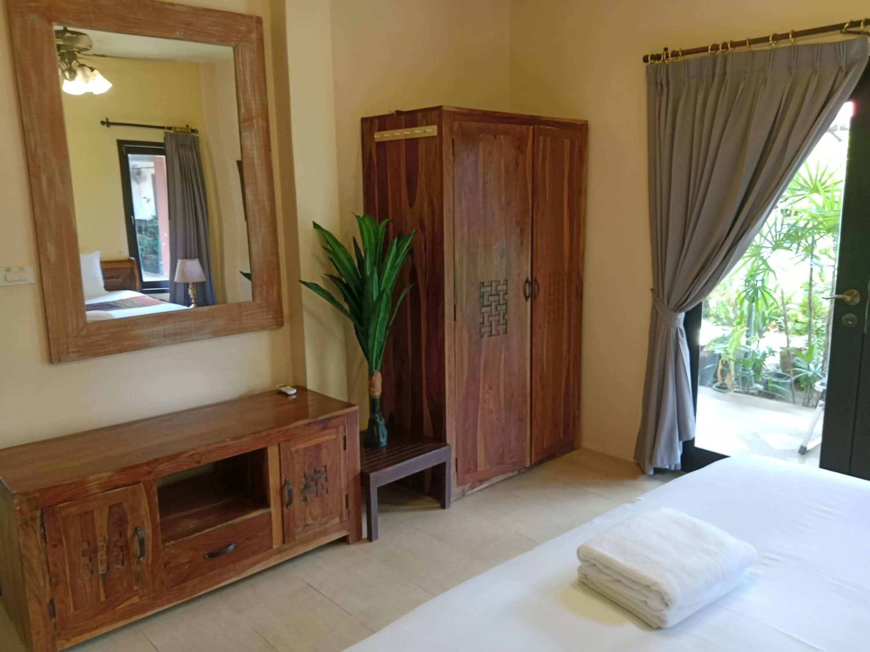 Bed in Baan Tropicana