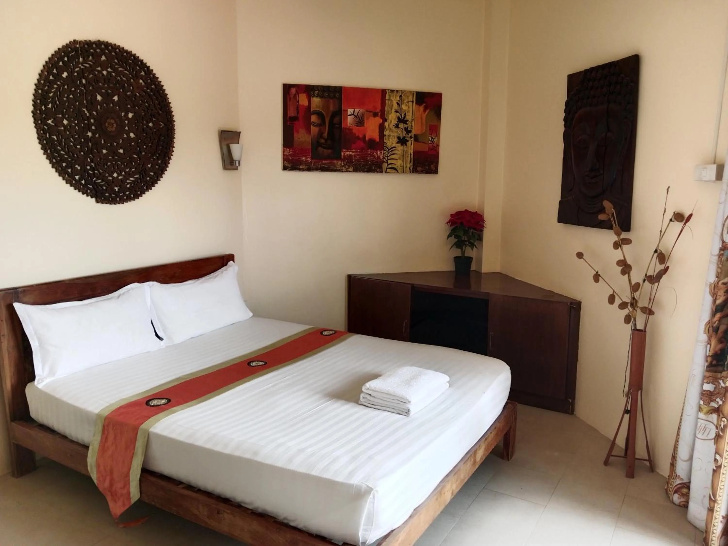 Bed in Baan Tropicana