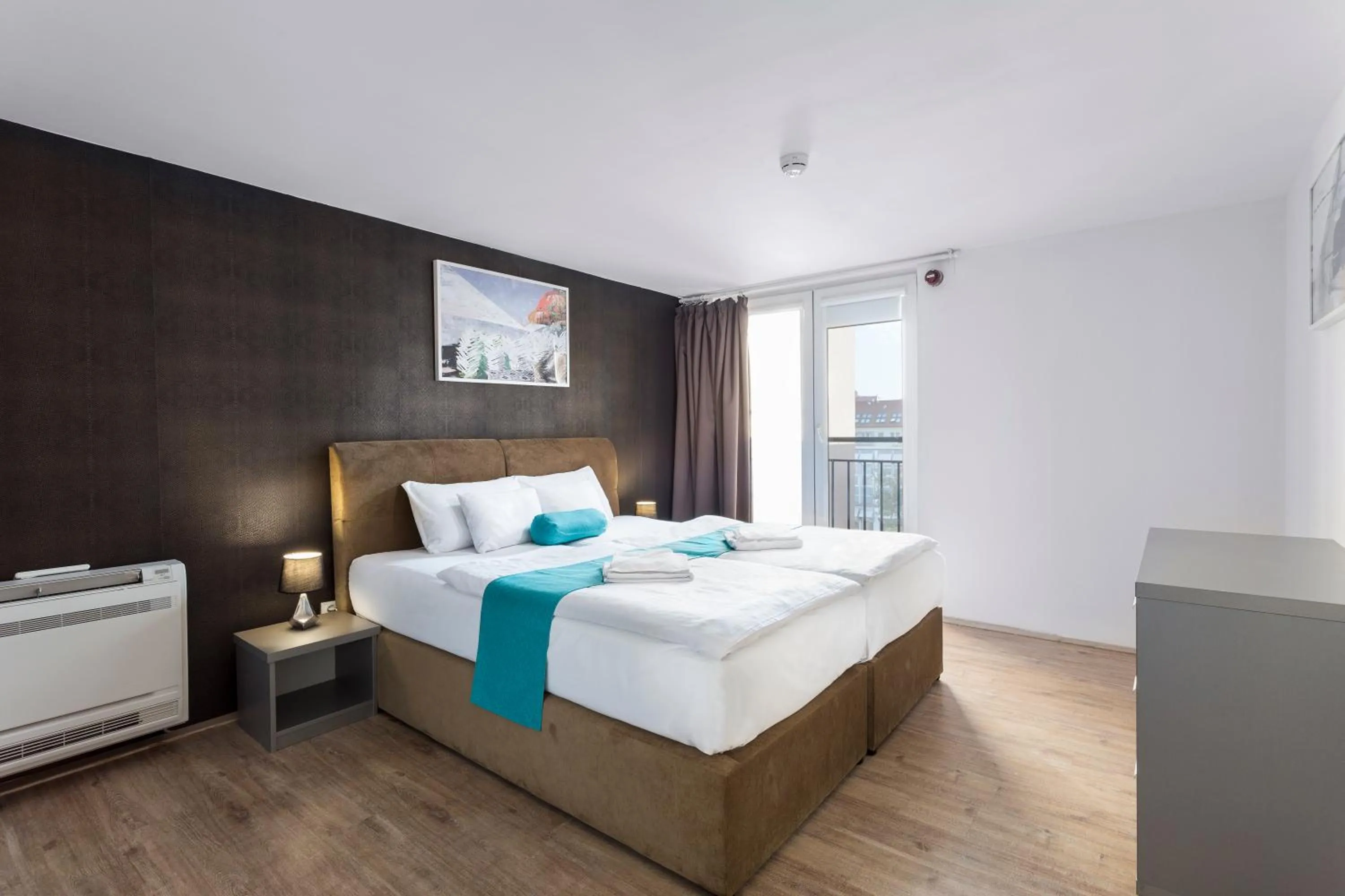 Bed in Hotel Mika Downtown