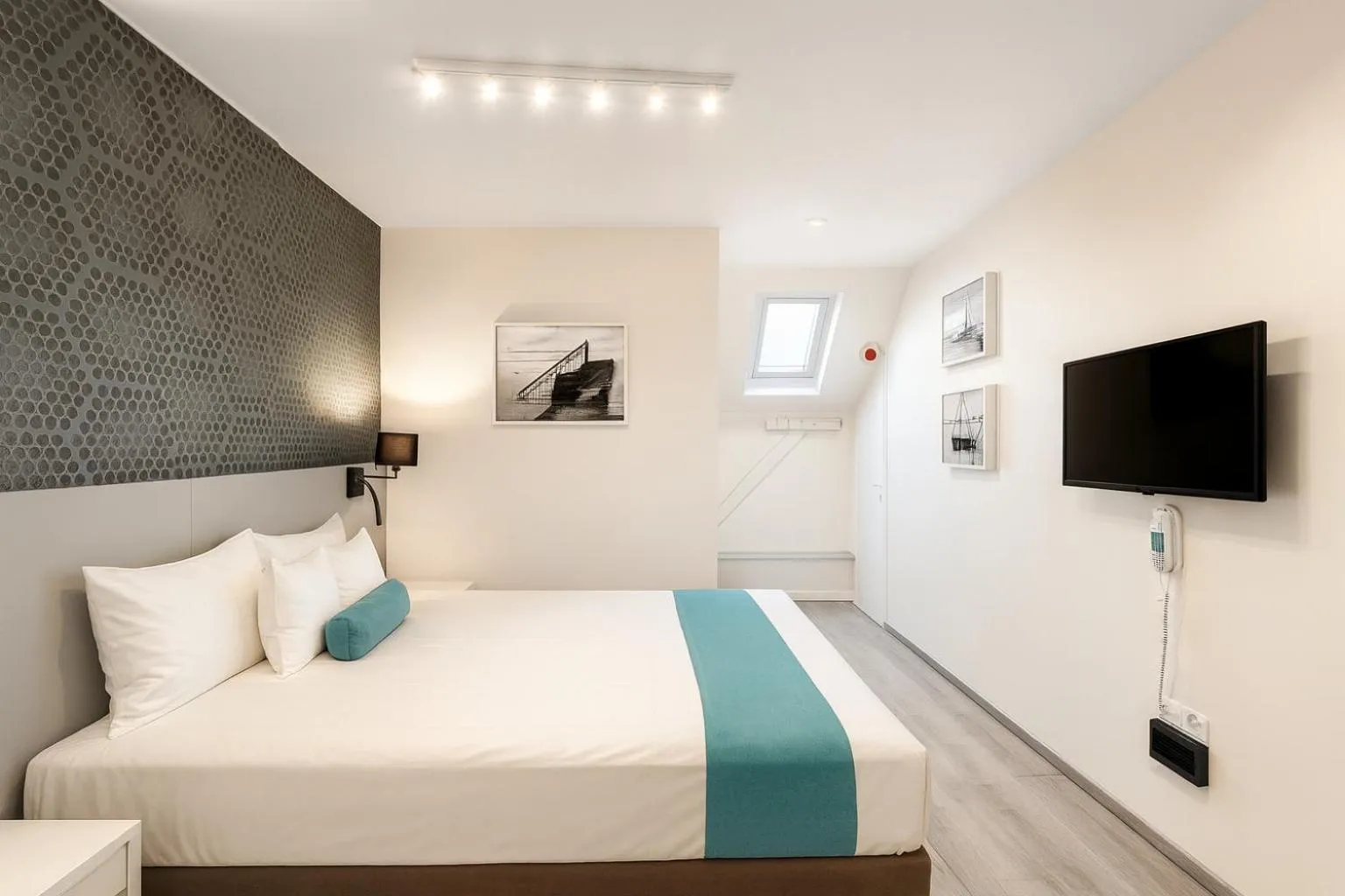 Bed in Hotel Mika Downtown