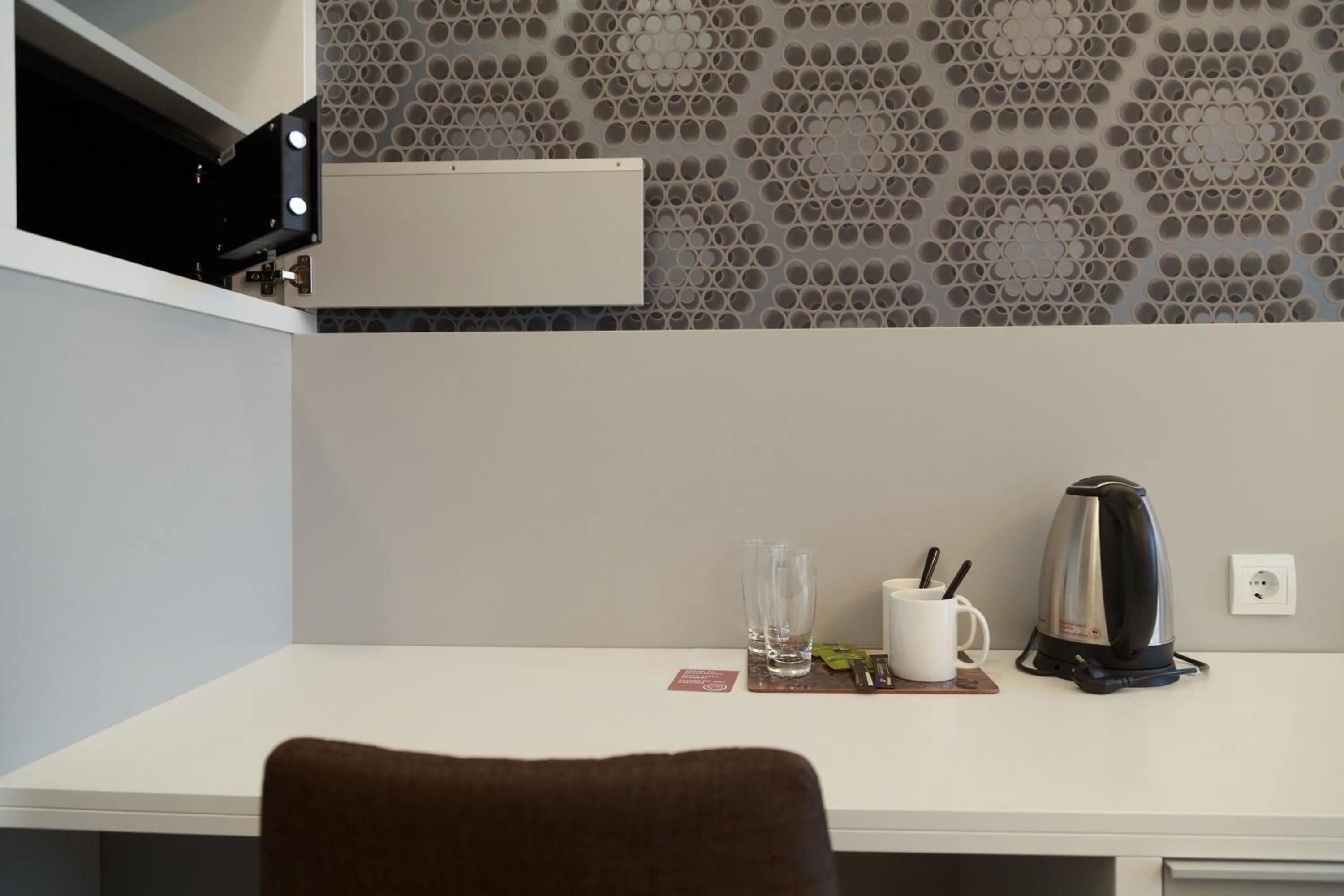 Bedroom in Hotel Mika Downtown