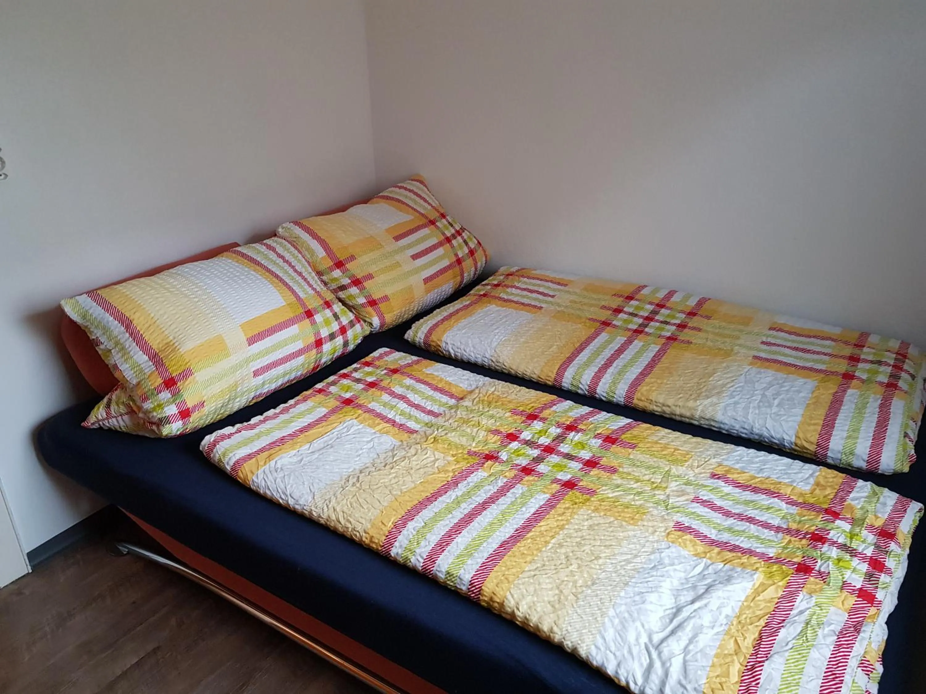 Bed in Ferienwohnung Eliah