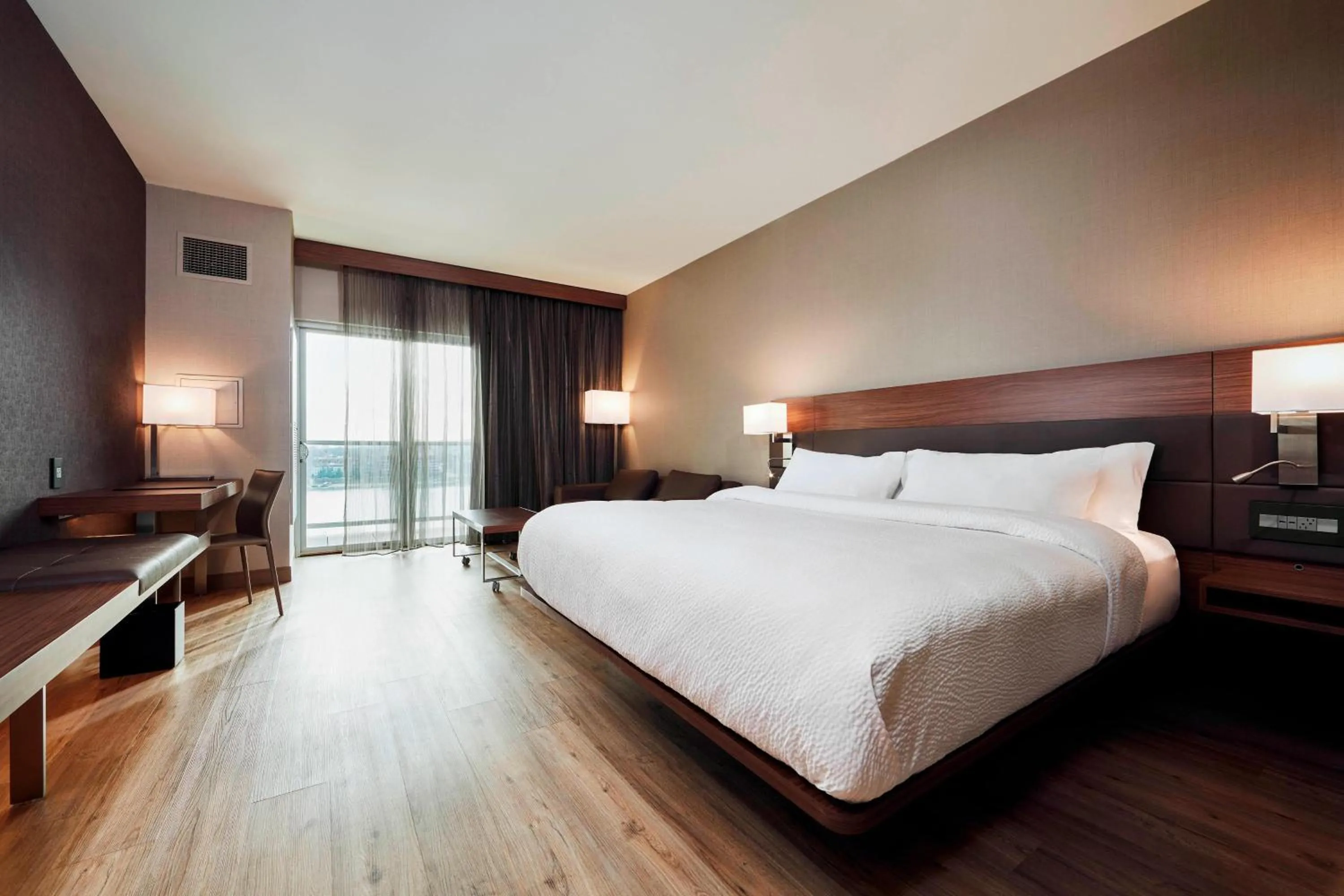 Photo of the whole room, Bed in AC Hotel by Marriott Cincinnati at The Banks