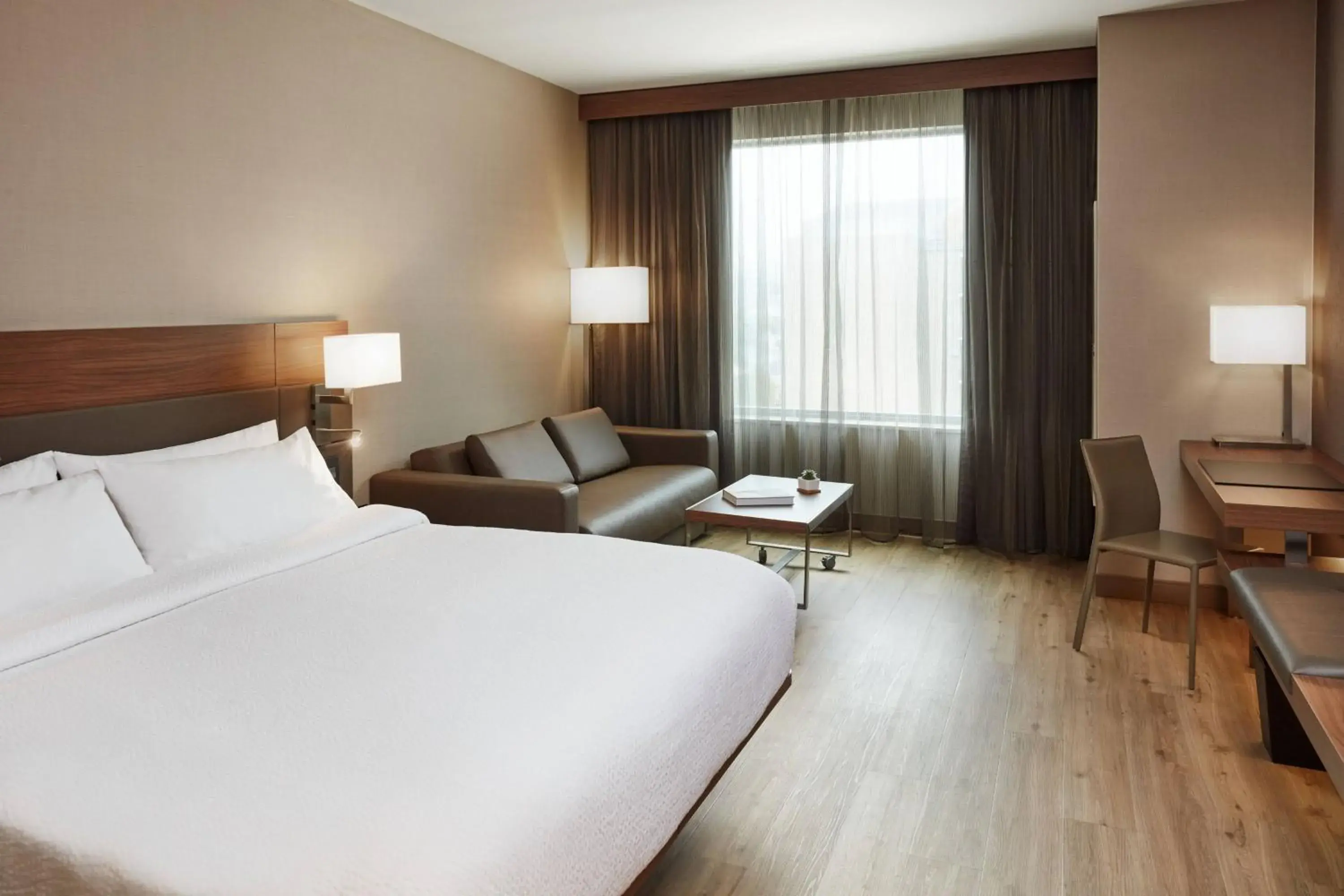 Guest room, 1 King, Ohio River view in AC Hotel by Marriott Cincinnati at The Banks Guest room, 1 King, Ohio River view in AC Hotel by Marriott Cincinnati at The Banks