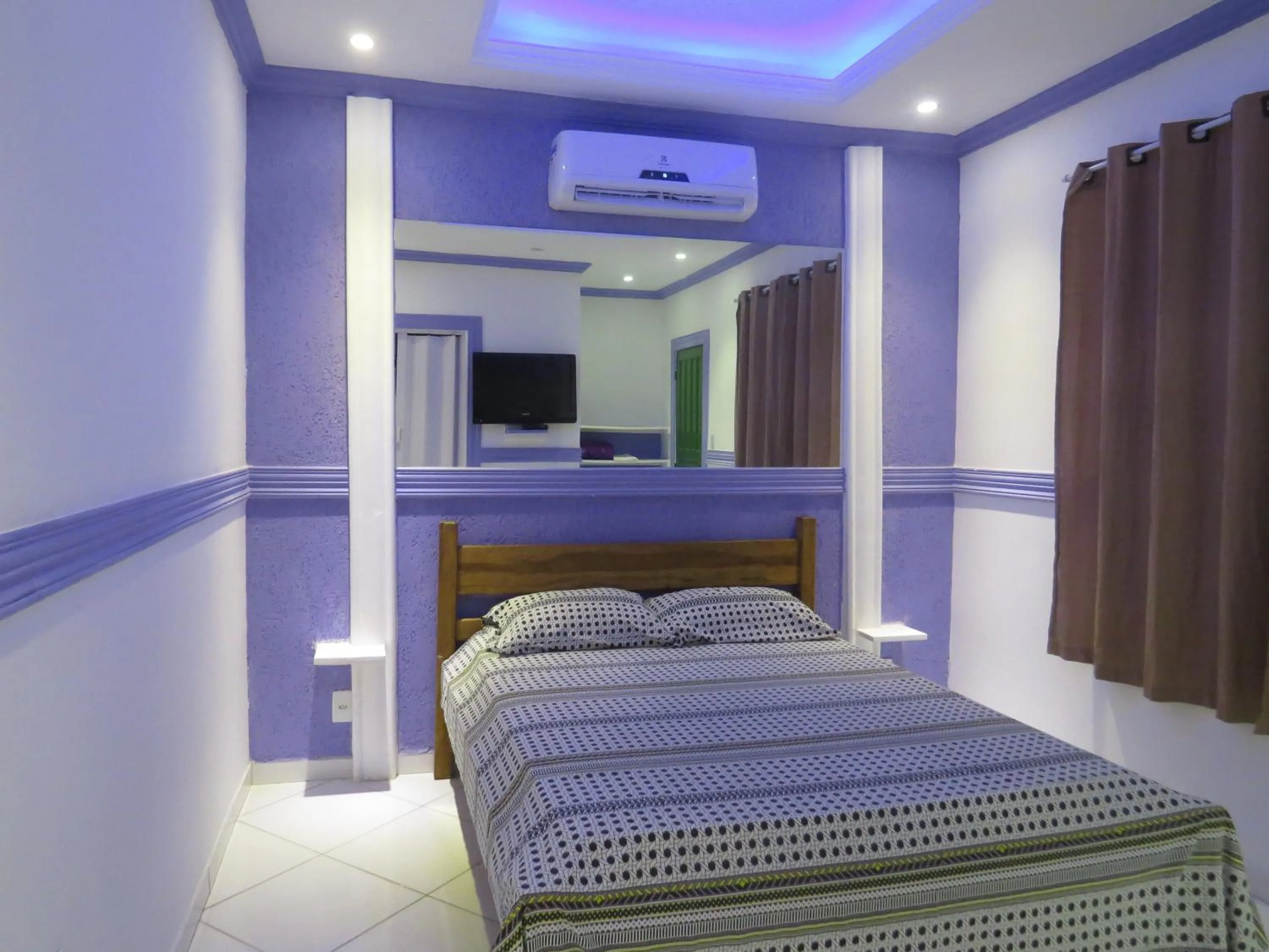 Bed in Pousada Caiçara