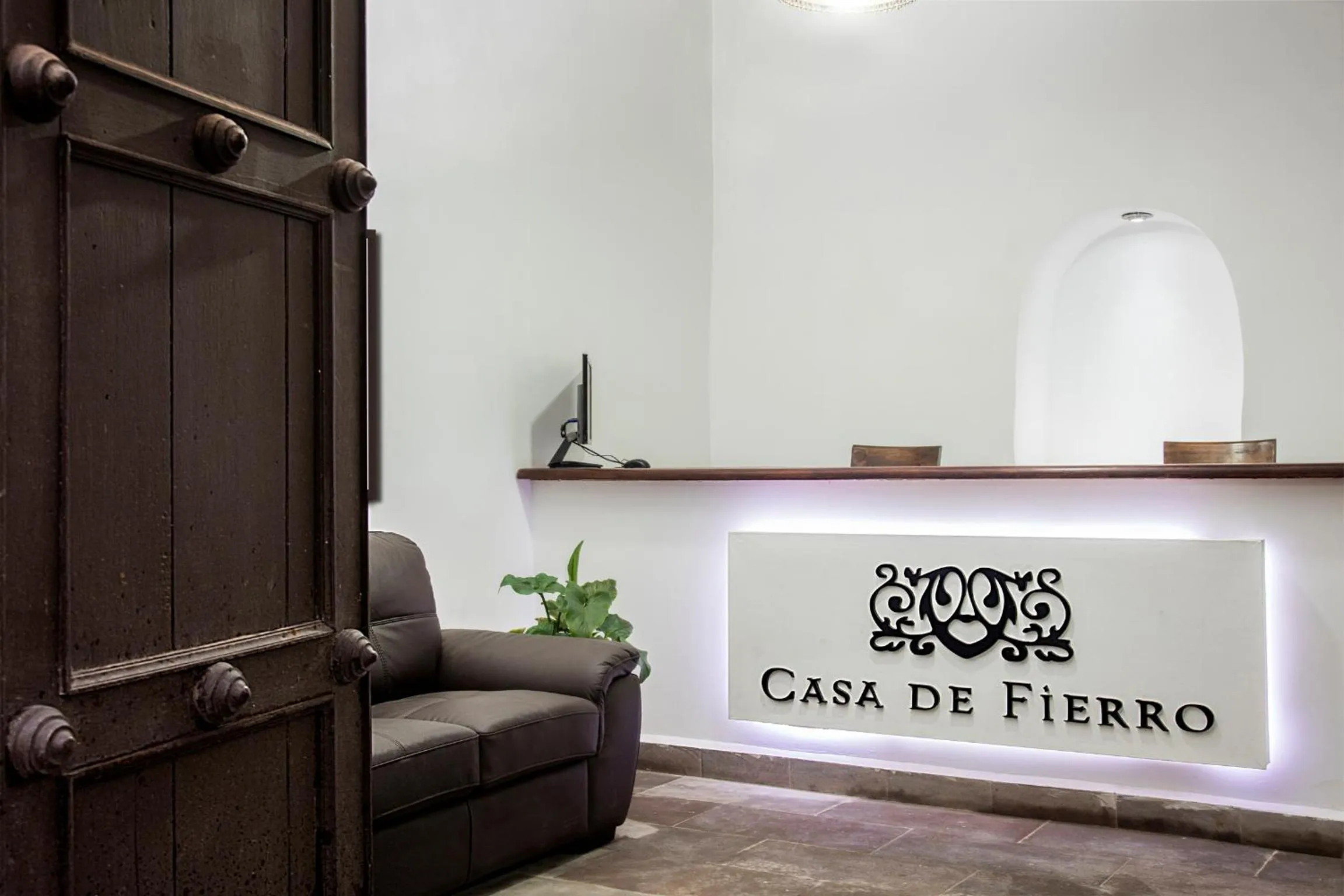 Property logo or sign in Hotel Casa Fierro Cusco