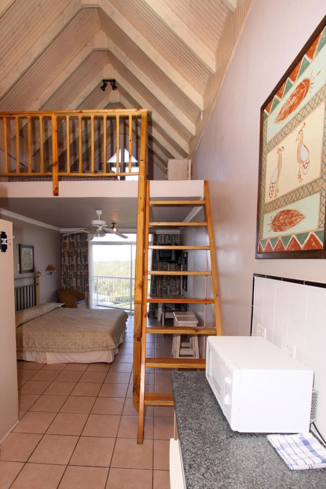 Bed in The Reef Apartments