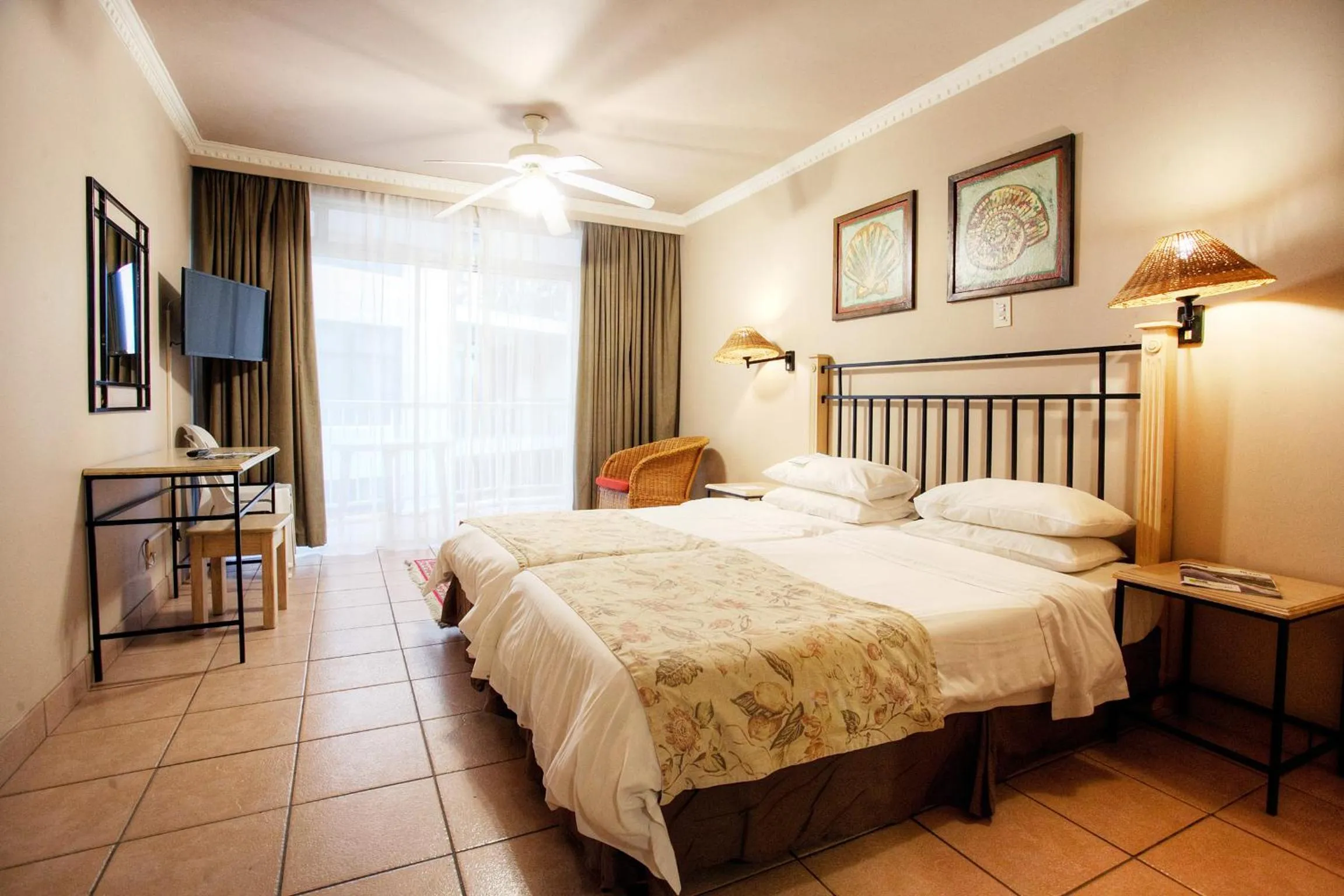 Bed in The Reef Apartments