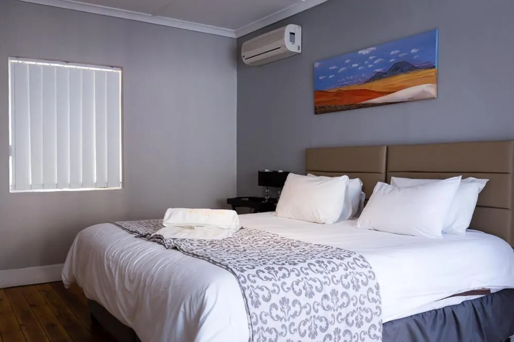 Bed in Okiep Country Hotel