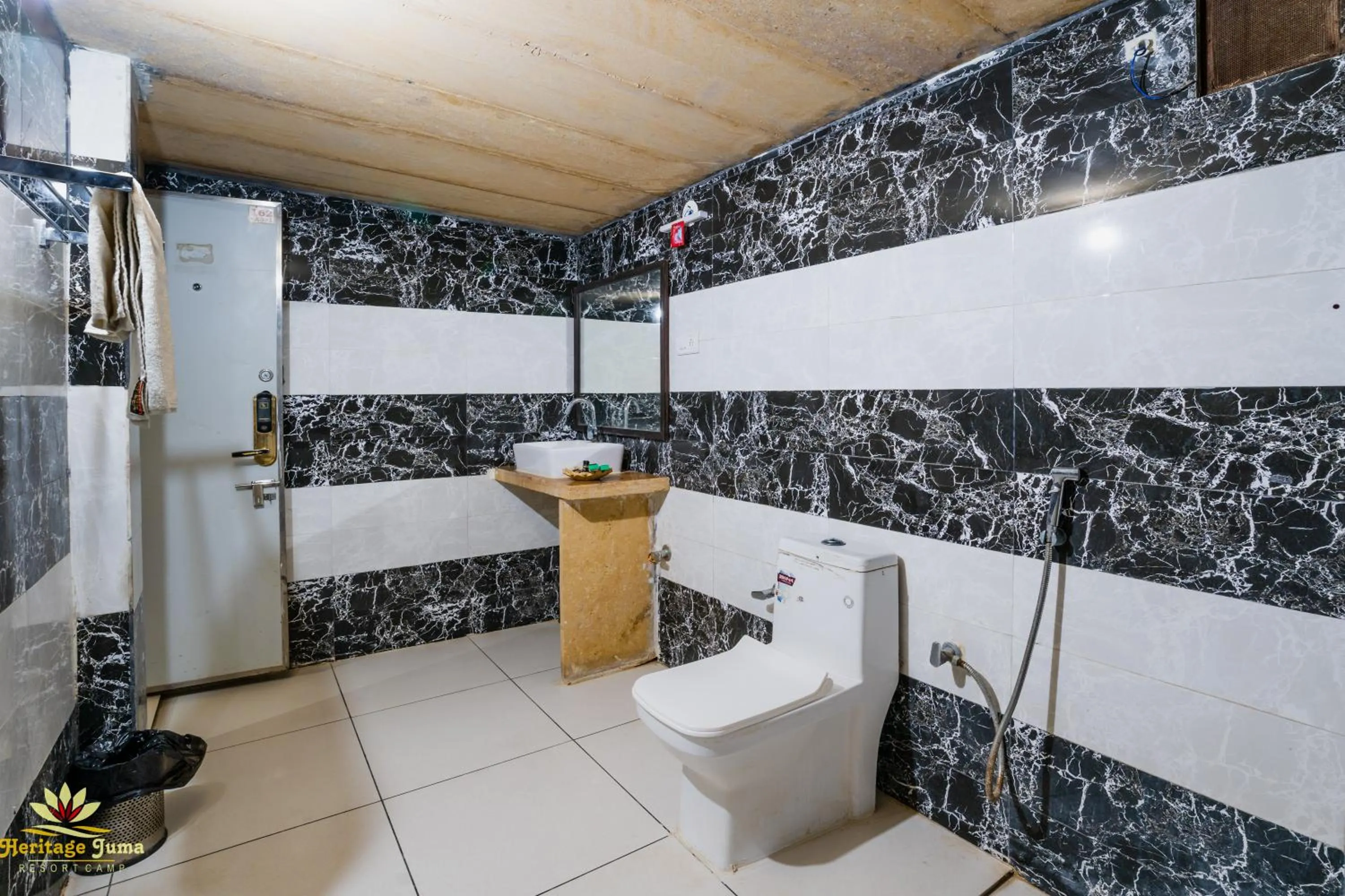 Bathroom in Heritage Juma Resort with swimming pool