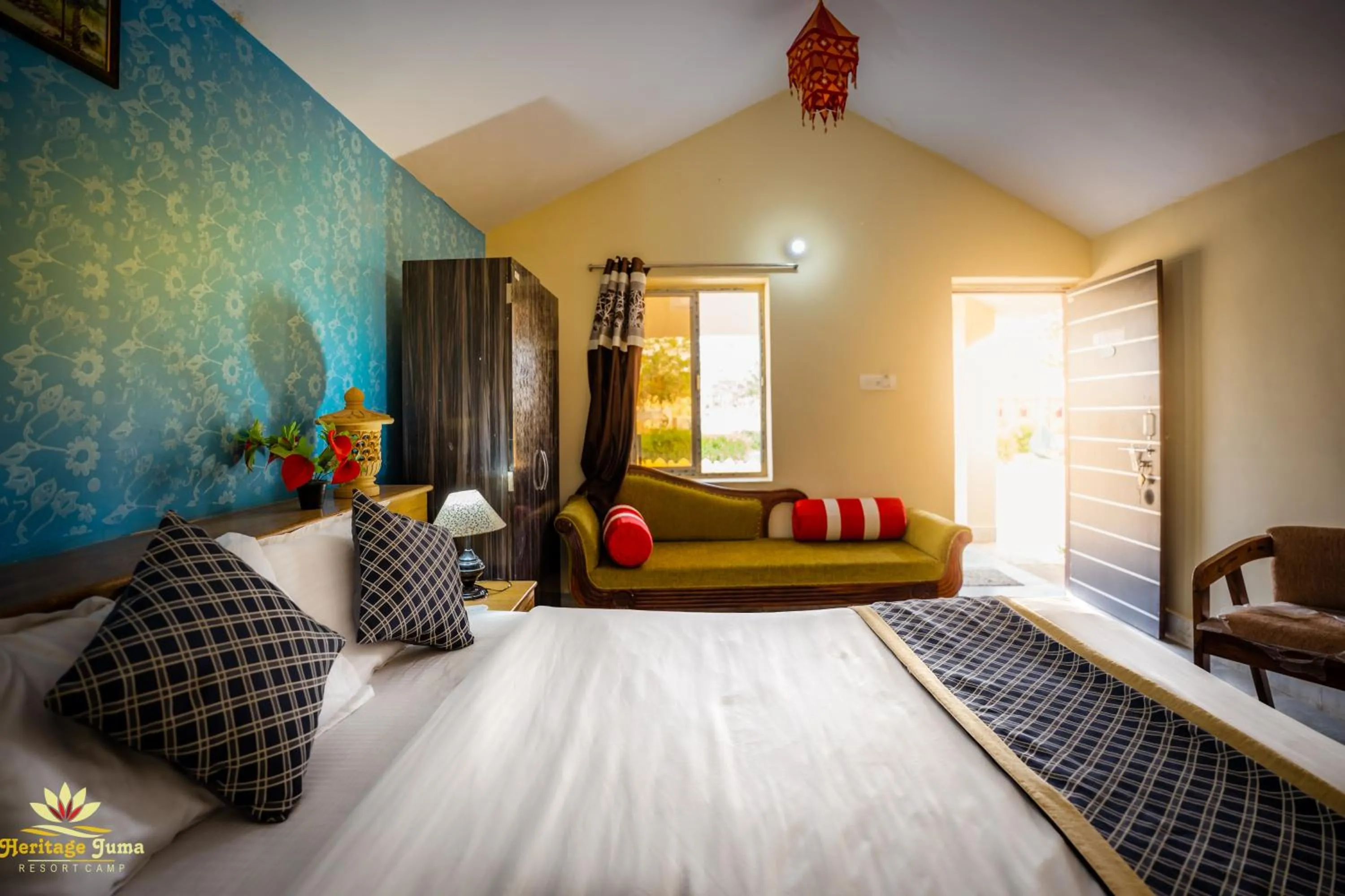 Bed in Heritage Juma Resort with swimming pool