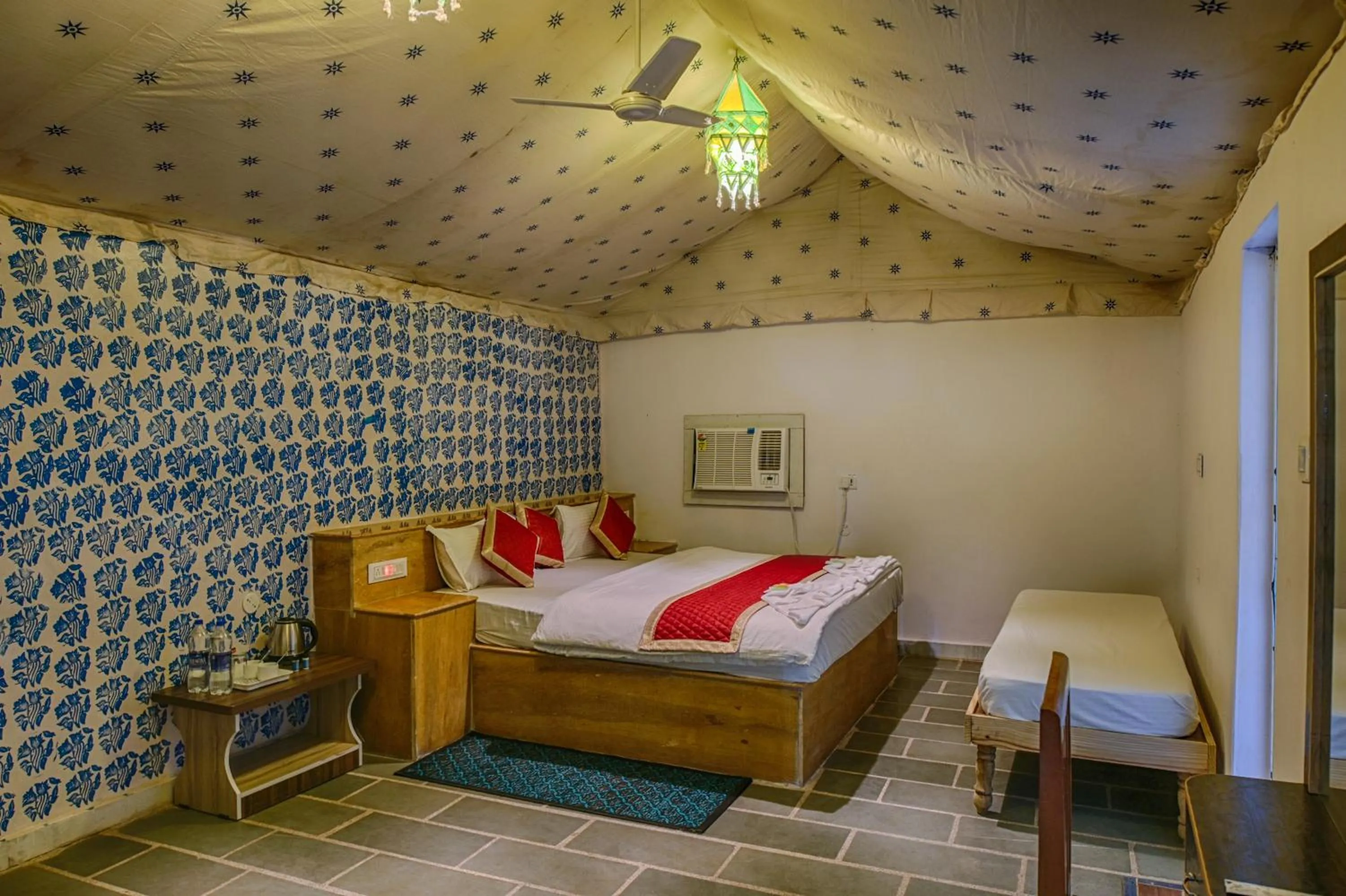 Bed in Heritage Juma Resort with swimming pool