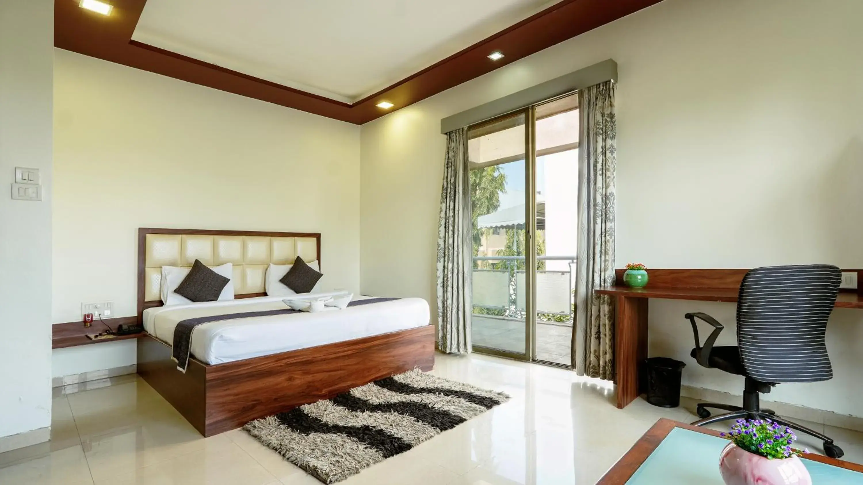 Deluxe Room with Balcony - single occupancy in Magnus Vosiv Suites Kalyani Nagar, Pune Deluxe Room with Balcony - single occupancy in Magnus Vosiv Suites Kalyani Nagar, Pune