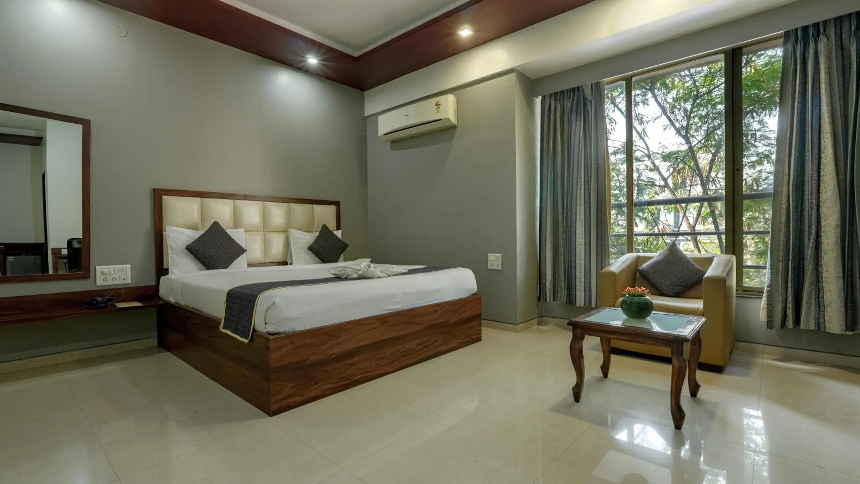 Deluxe Room with Balcony - single occupancy in Magnus Vosiv Suites Kalyani Nagar Deluxe Room with Balcony - single occupancy in Magnus Vosiv Suites Kalyani Nagar