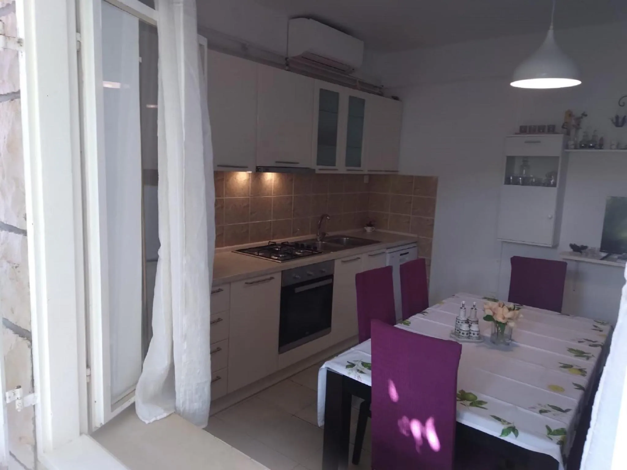 Kitchen or kitchenette in Apartments Marita