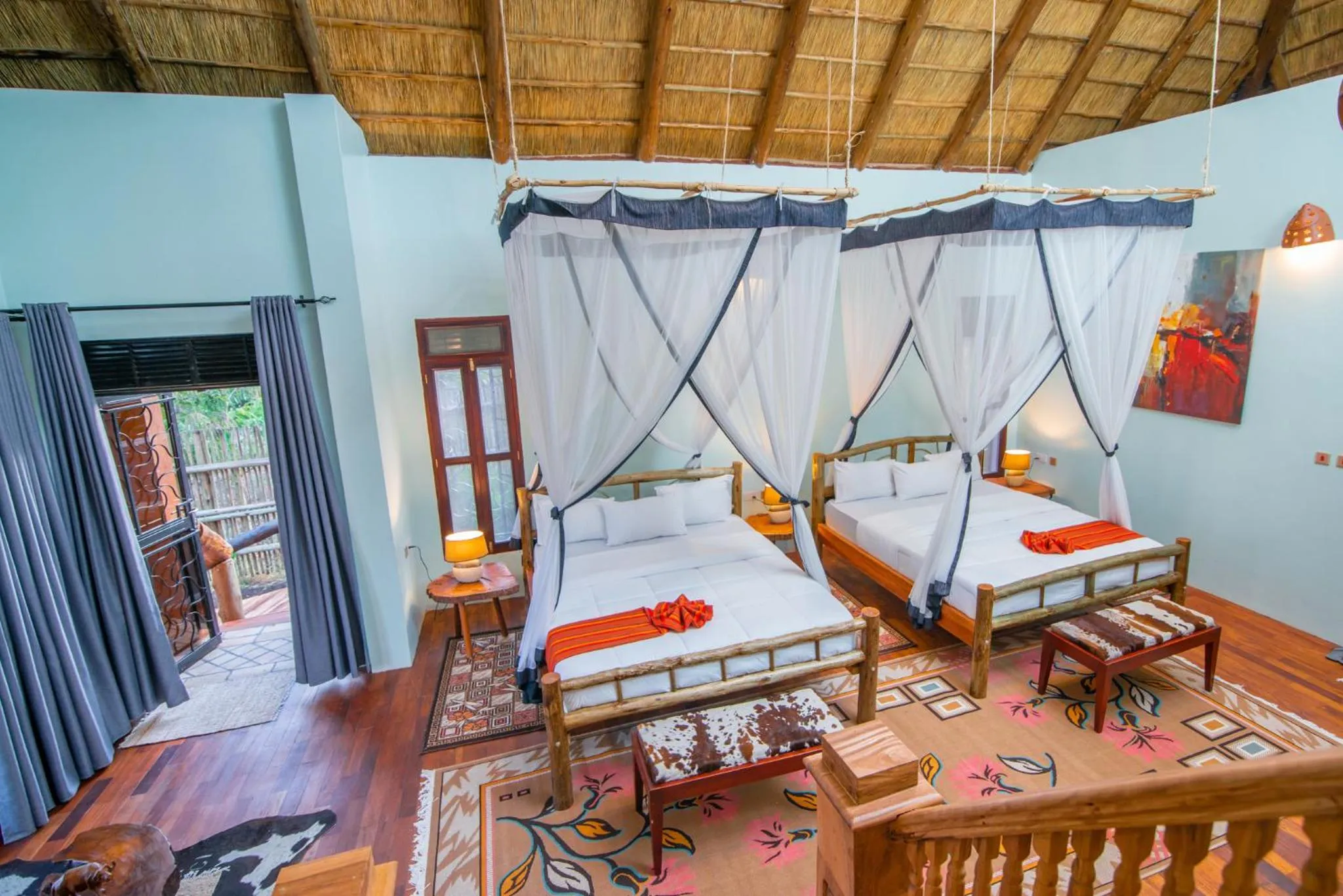Seating area, Bed in Buffalo Safari Lodge