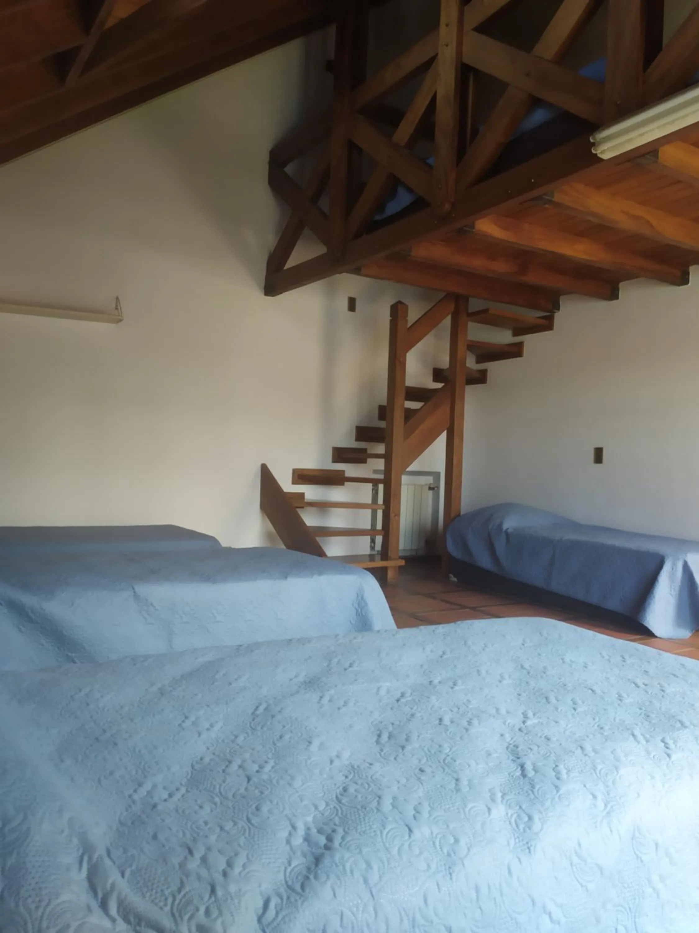 Bed in Tanino Guest House