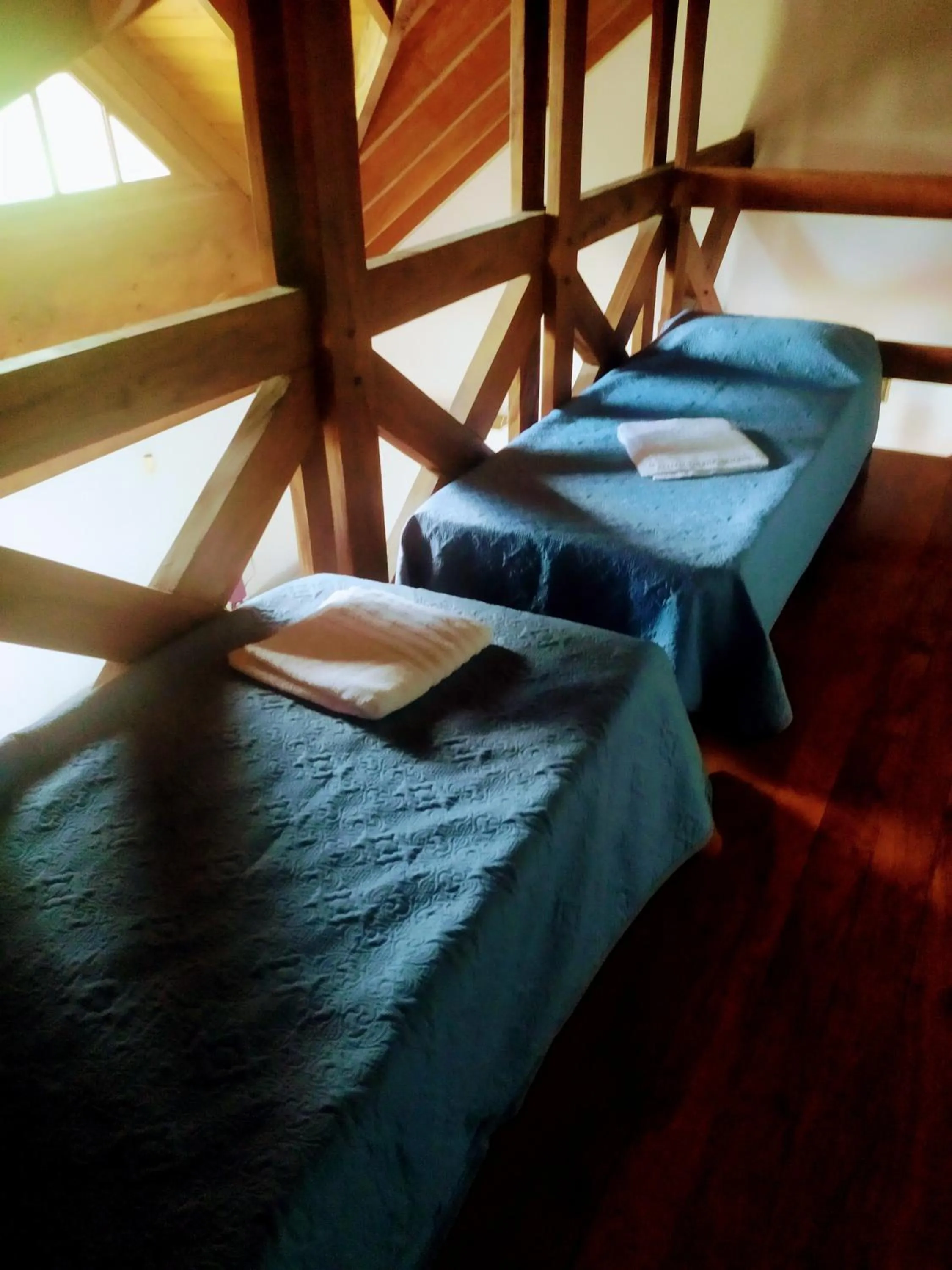 Bed in Tanino Guest House