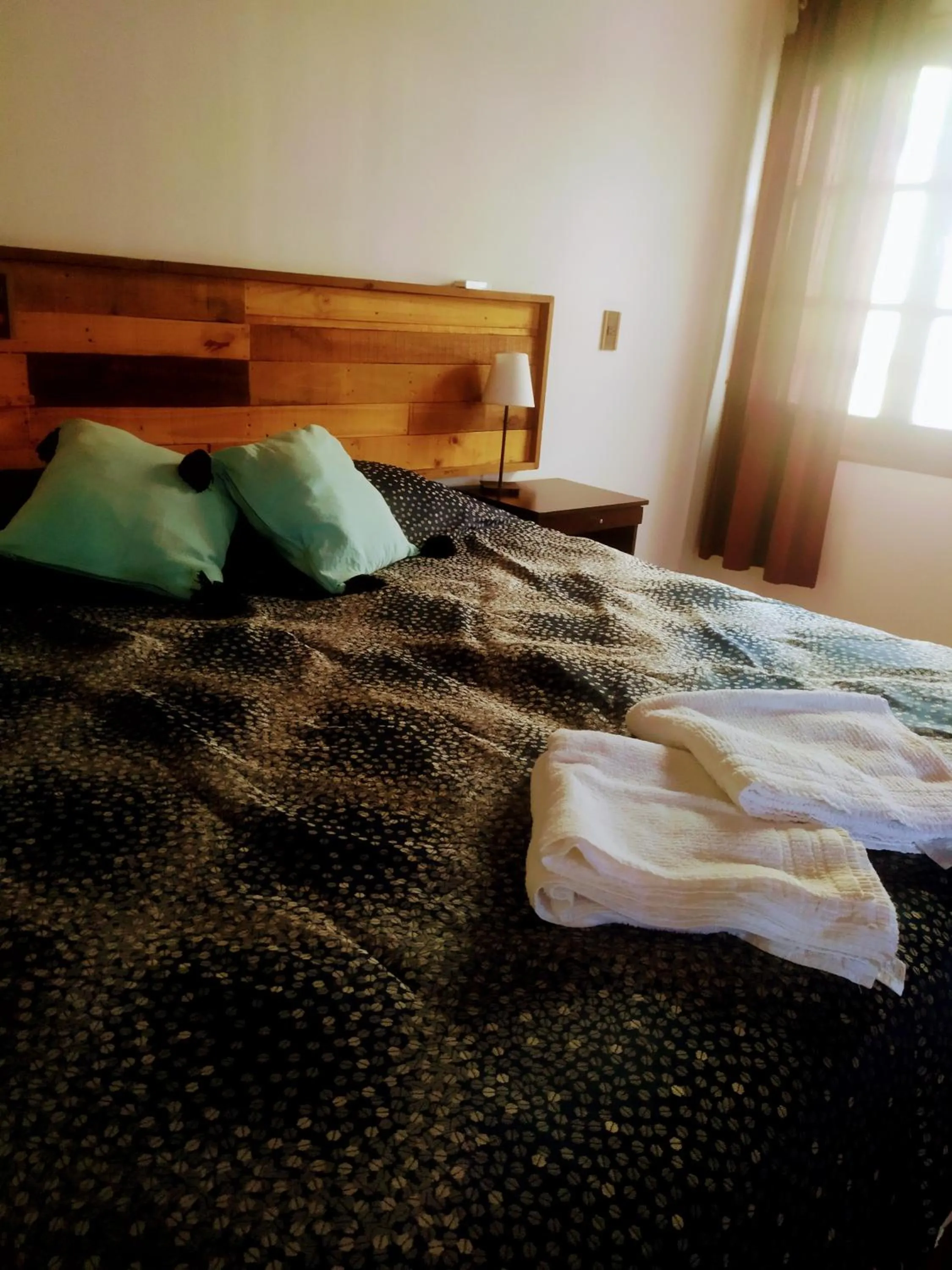 Bed in Tanino Guest House
