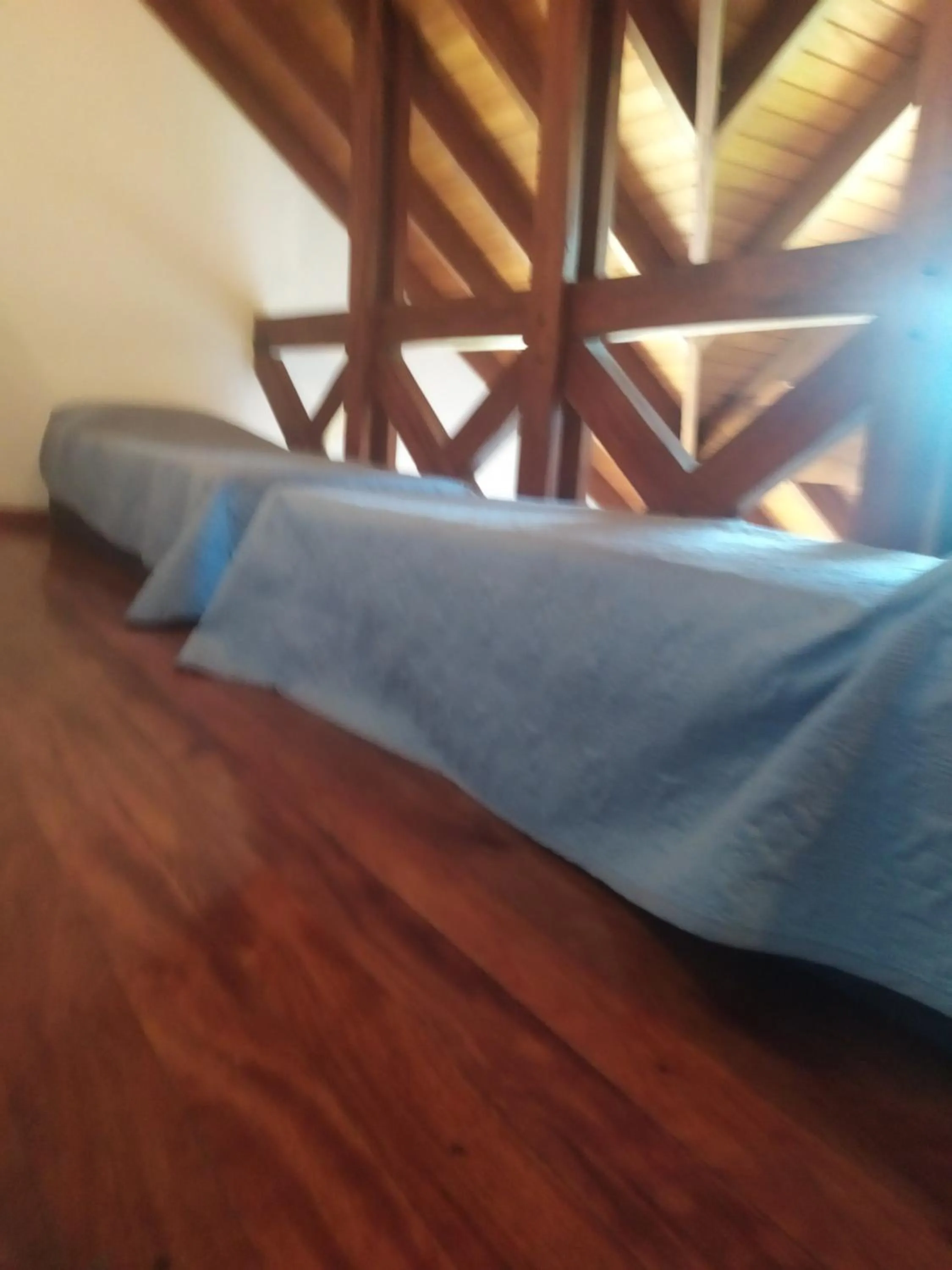 Bed in Tanino Guest House
