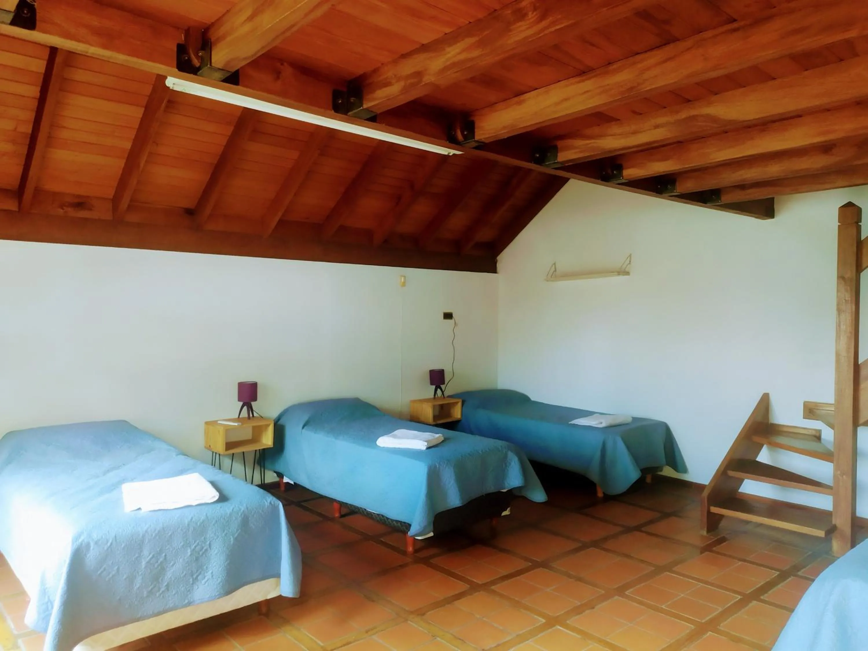 Bed in Tanino Guest House