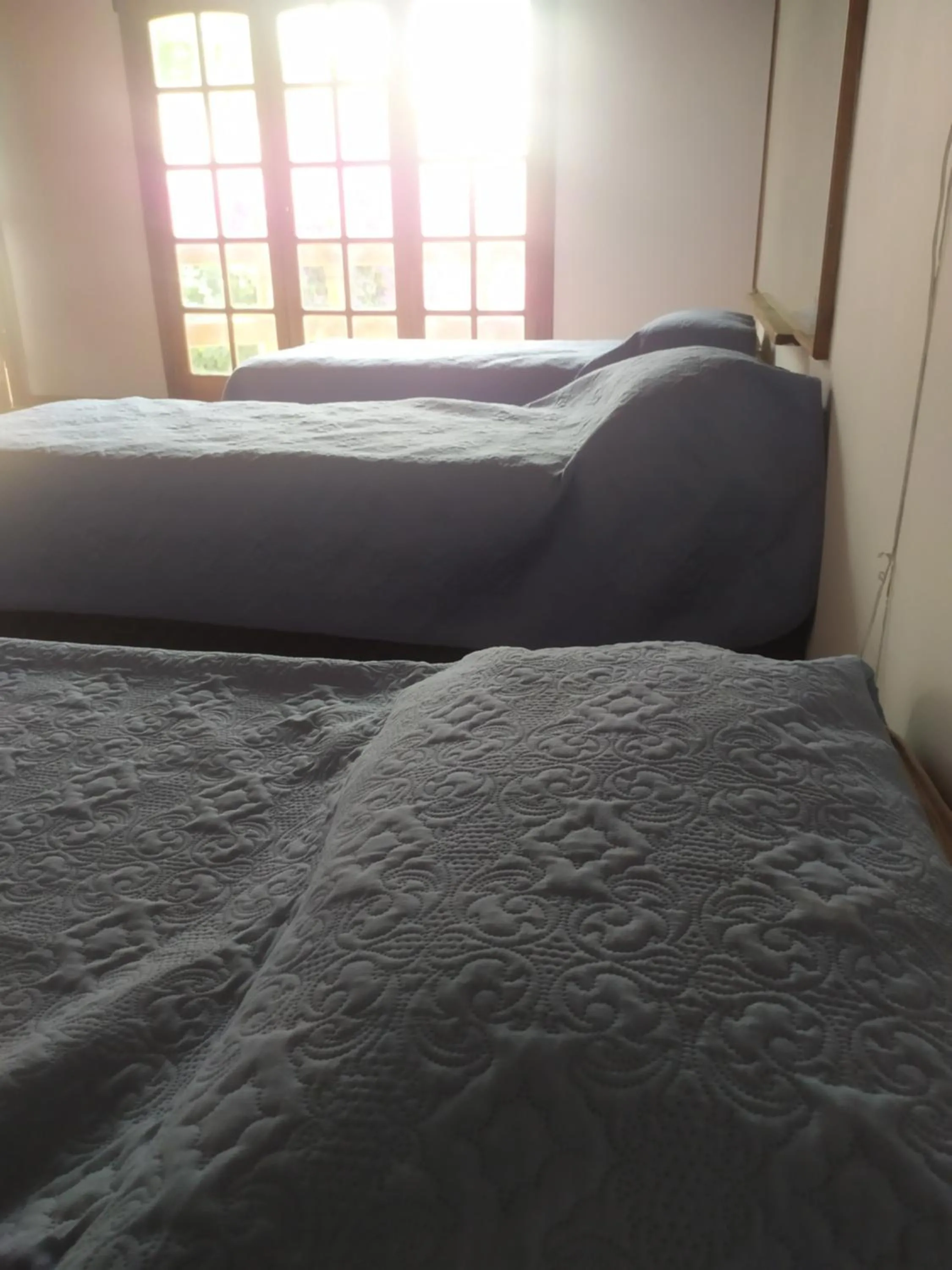 Bed in Tanino Guest House