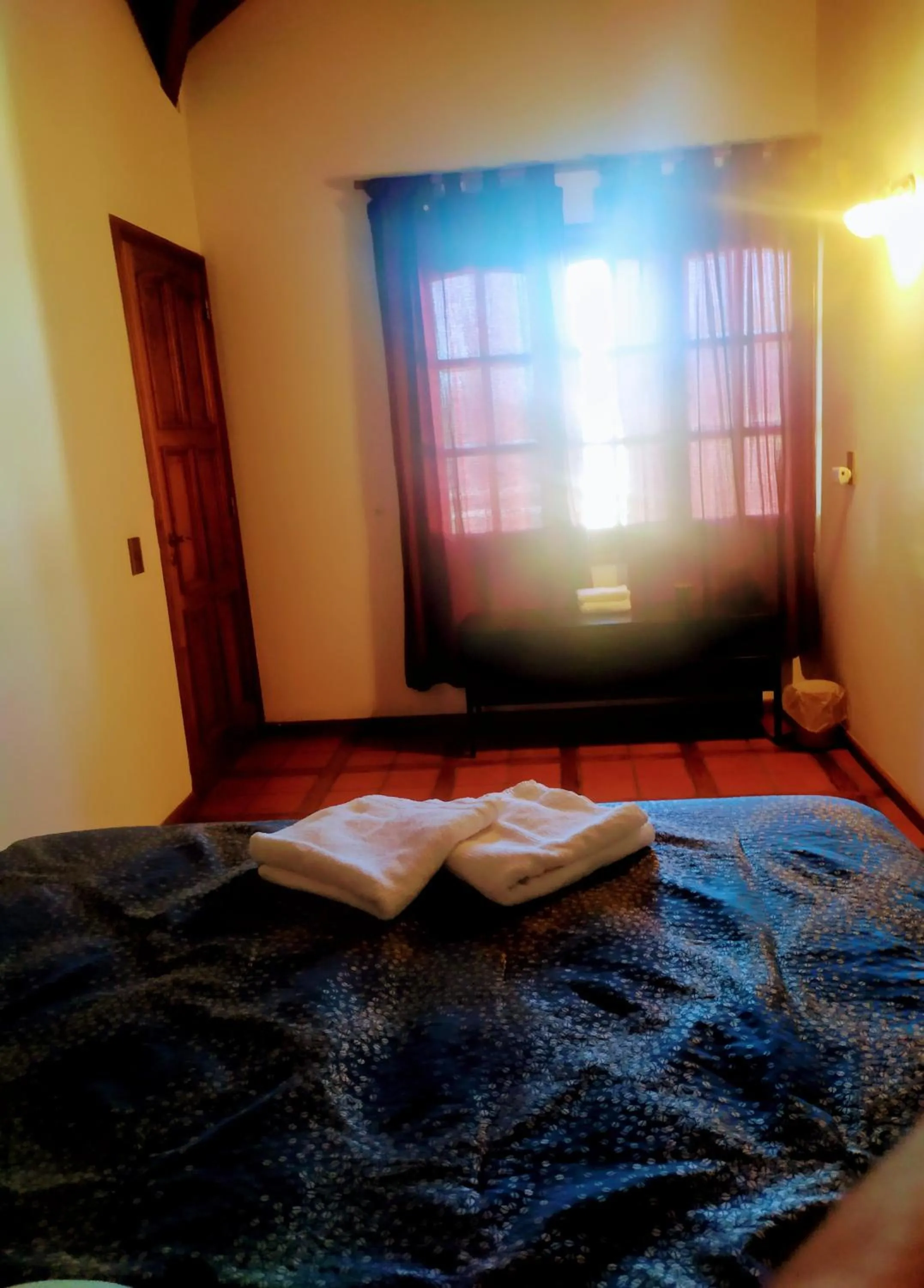 Bed in Tanino Guest House