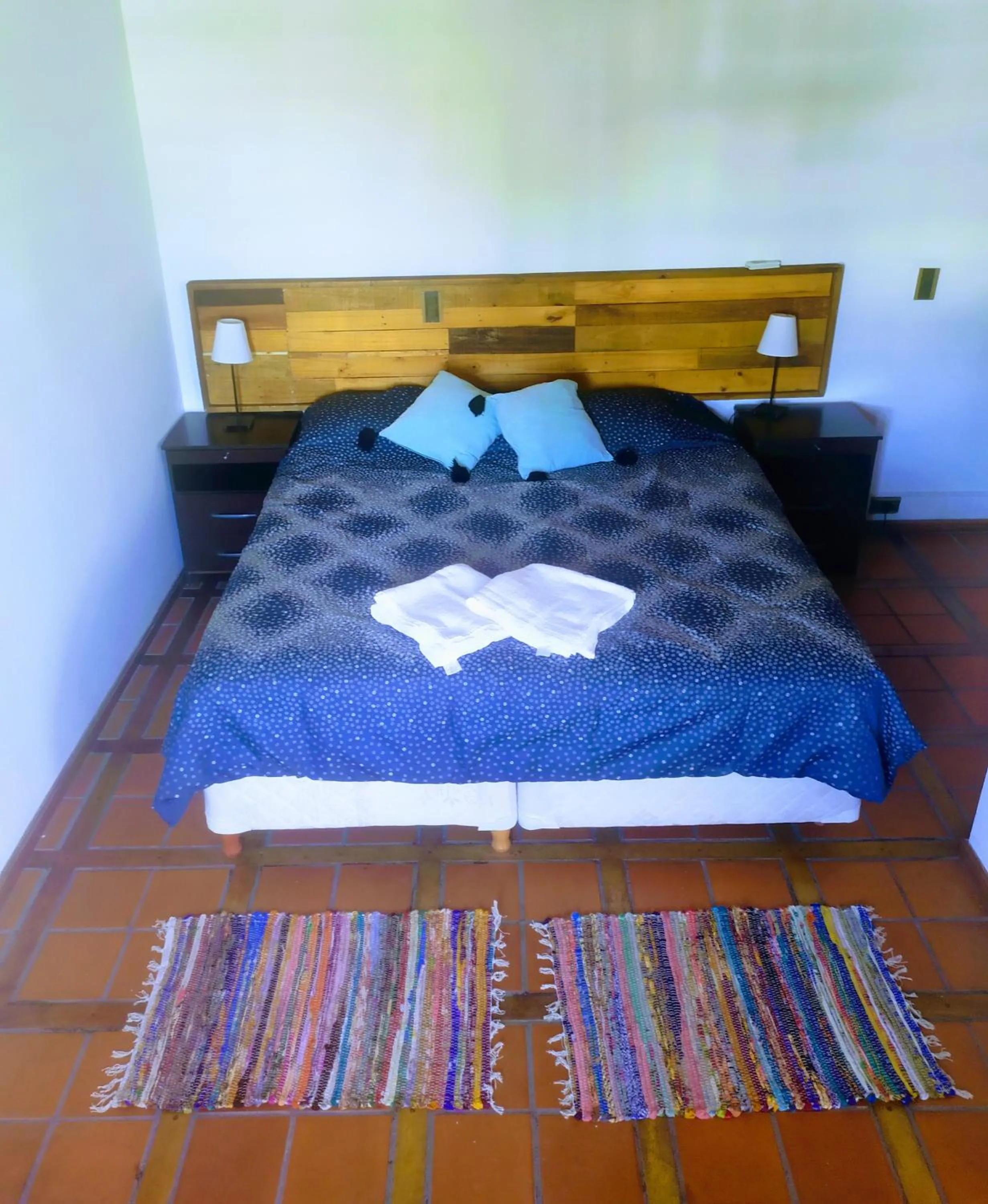 Bed in Tanino Guest House