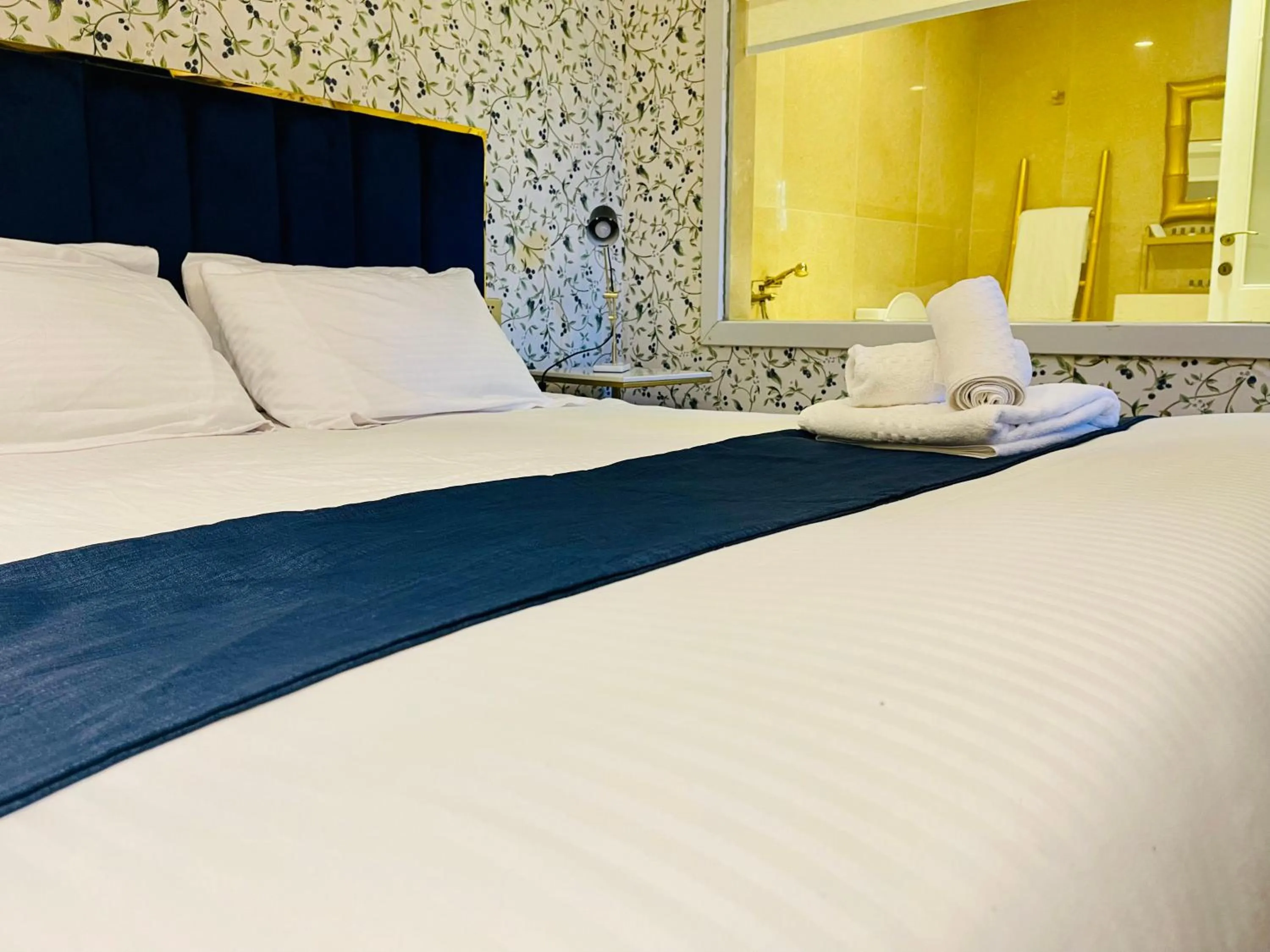 Bed in The Red Farm Relais & Spa