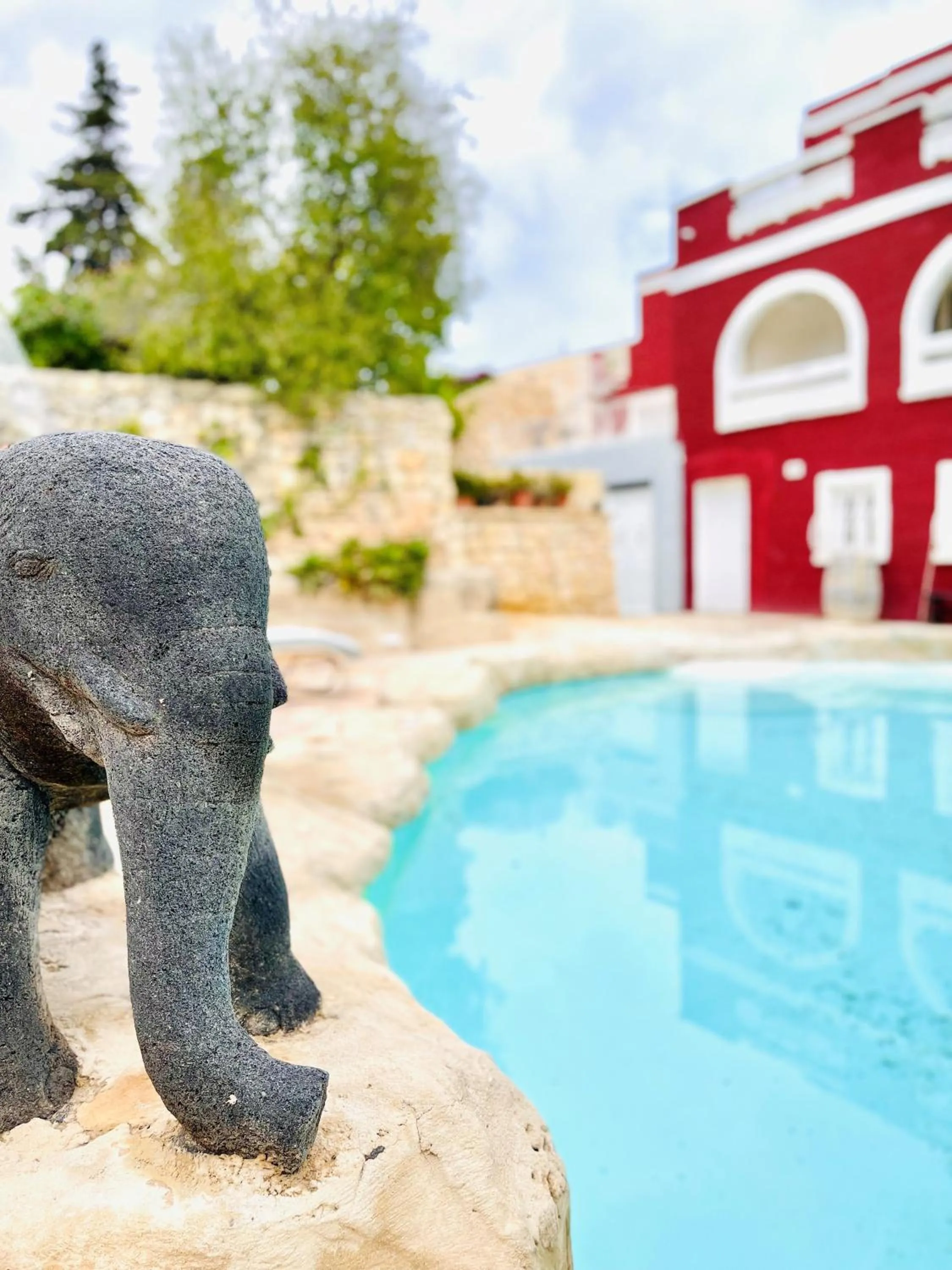 Swimming pool in The Red Farm Relais & Spa
