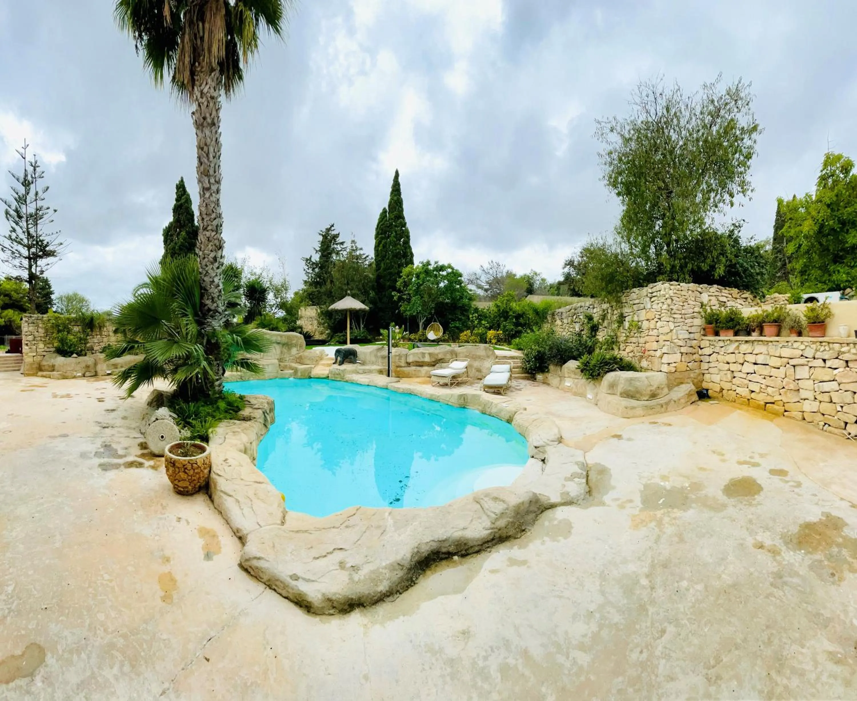 Swimming pool in The Red Farm Relais & Spa