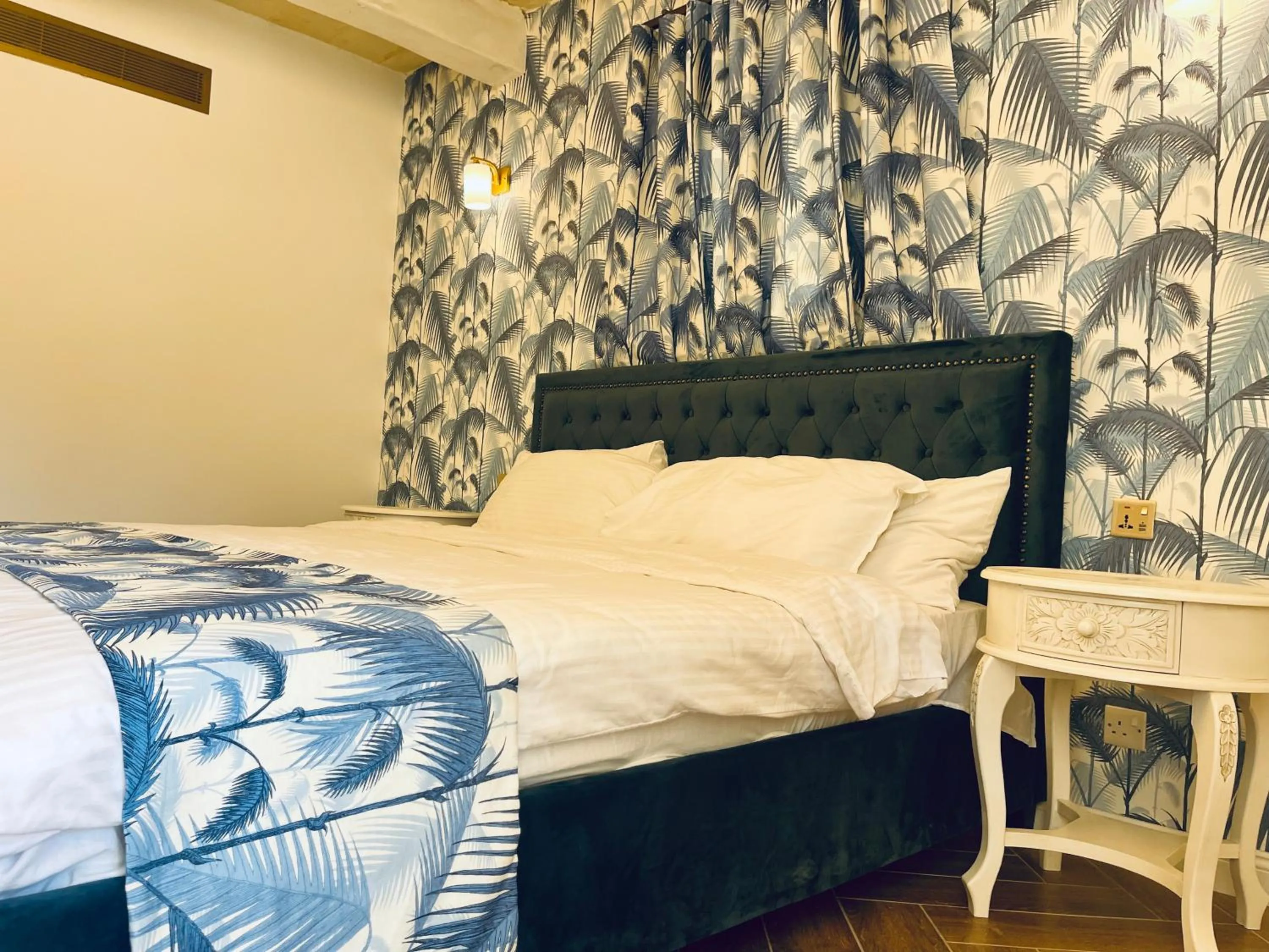 Bed in The Red Farm Relais & Spa