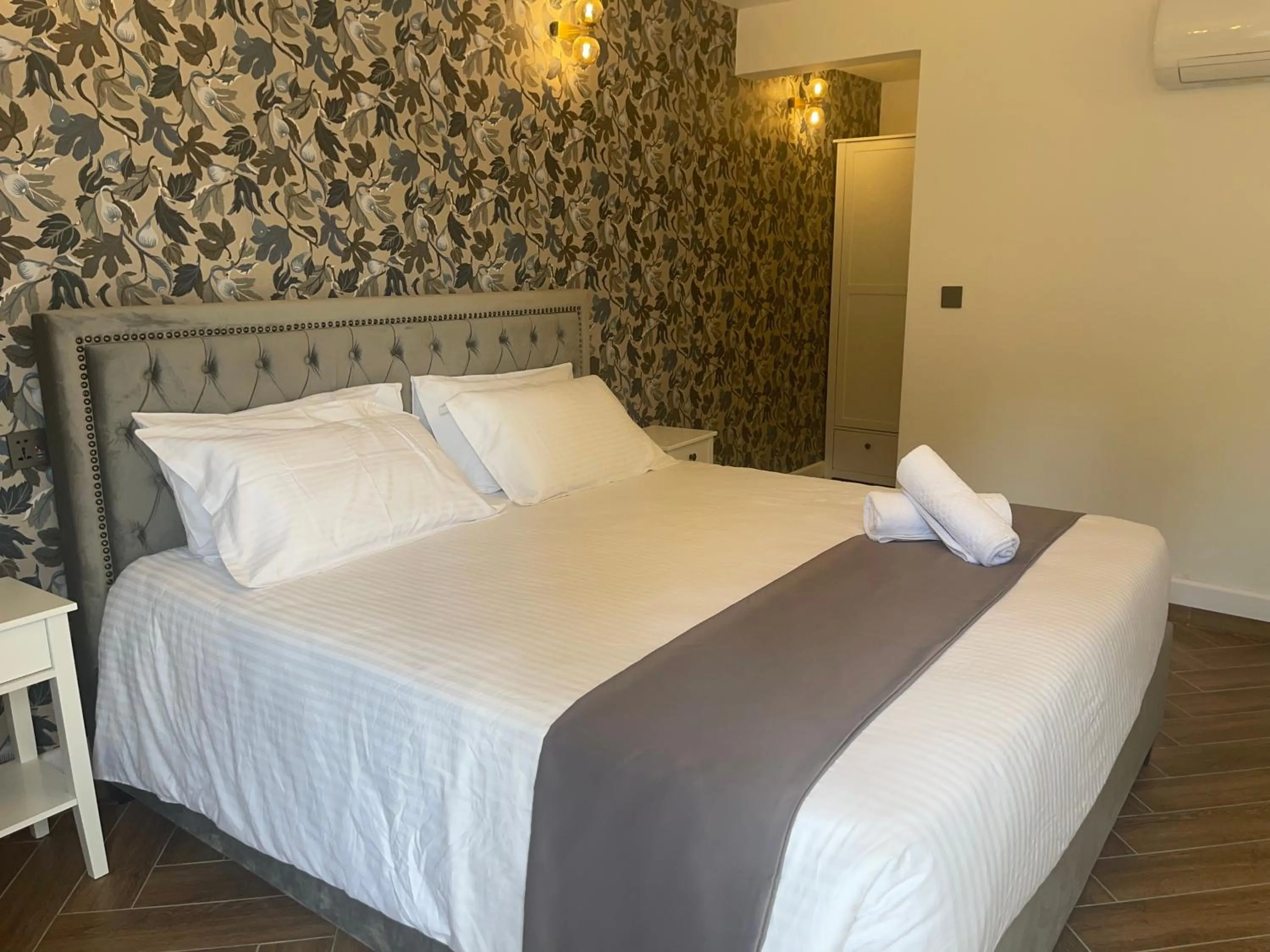 Bed in The Red Farm Relais & Spa