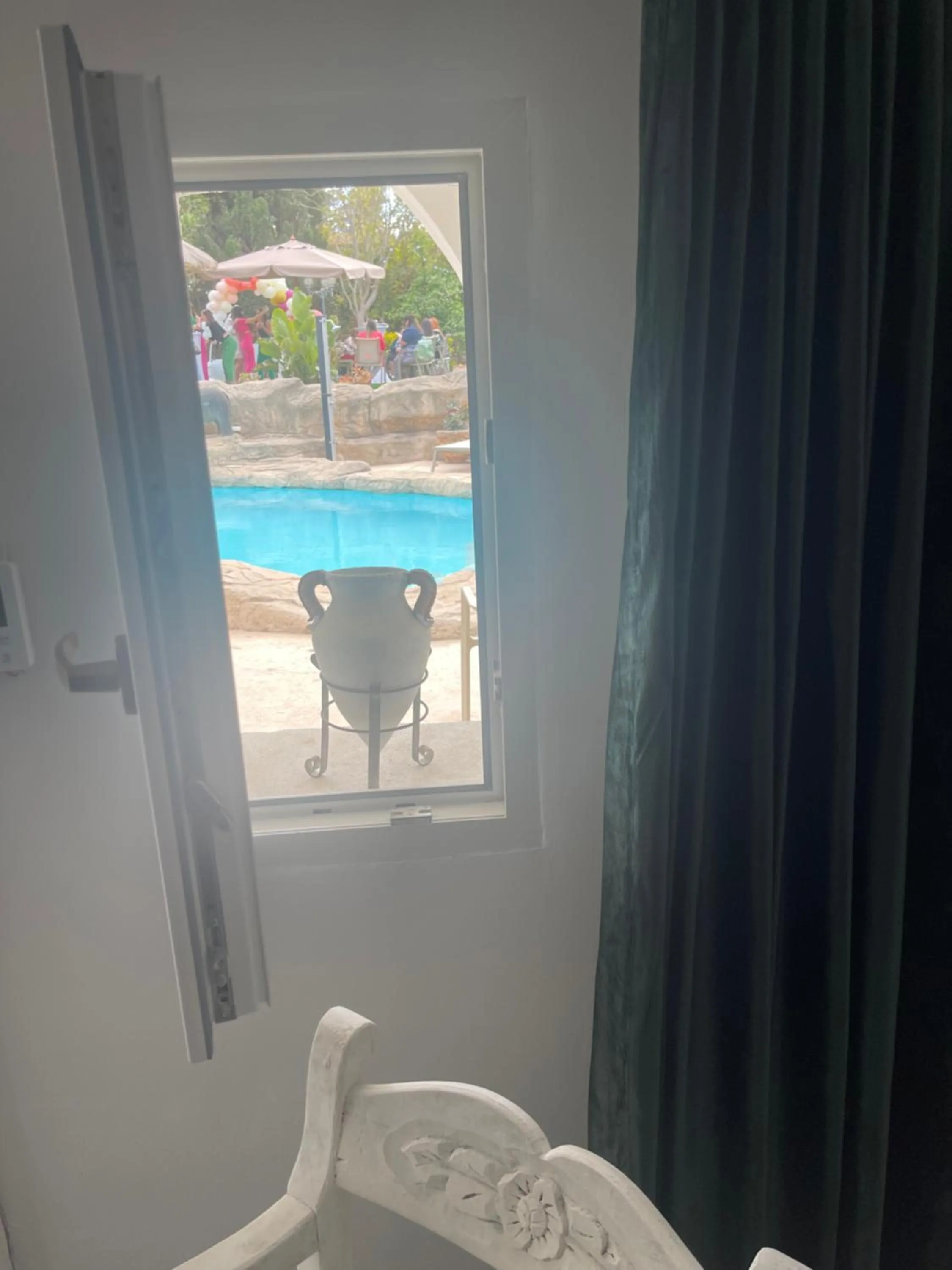 Pool view in The Red Farm Relais & Spa