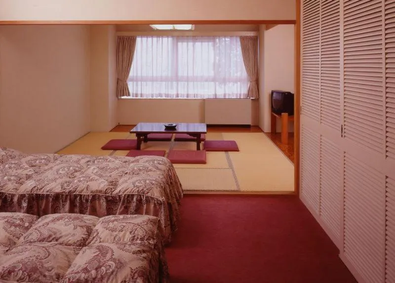 Bed in Hotel Chalet Yuzawa Ginsui