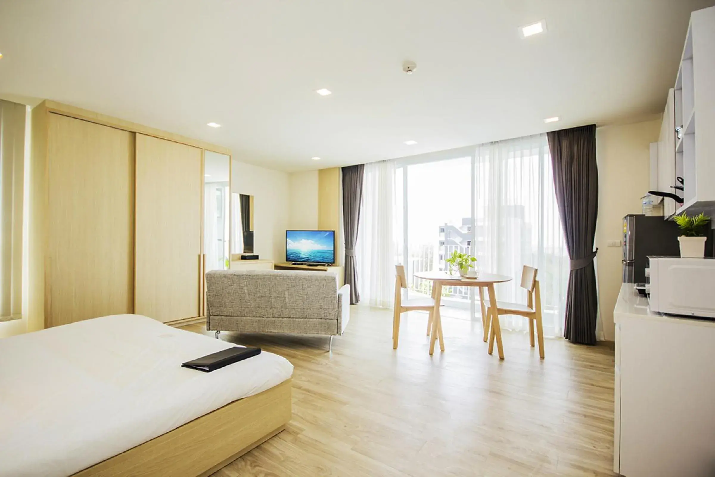 Photo of the whole room, Bed in Karin hotel & Service apartment - SHA Extra Plus Photo of the whole room, Bed in Karin hotel & Service apartment - SHA Extra Plus