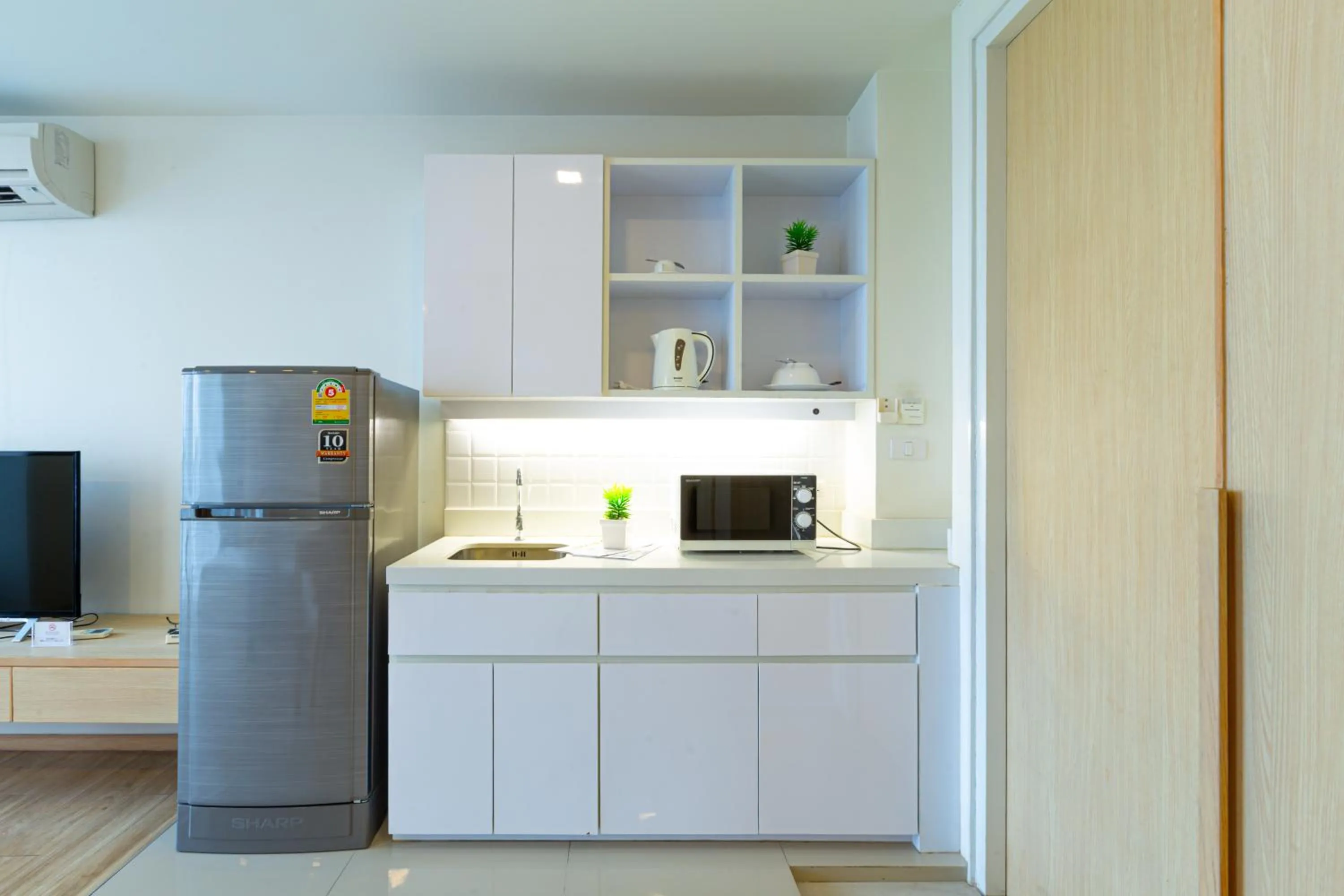 Kitchen or kitchenette in Karin hotel & Service apartment - SHA Extra Plus