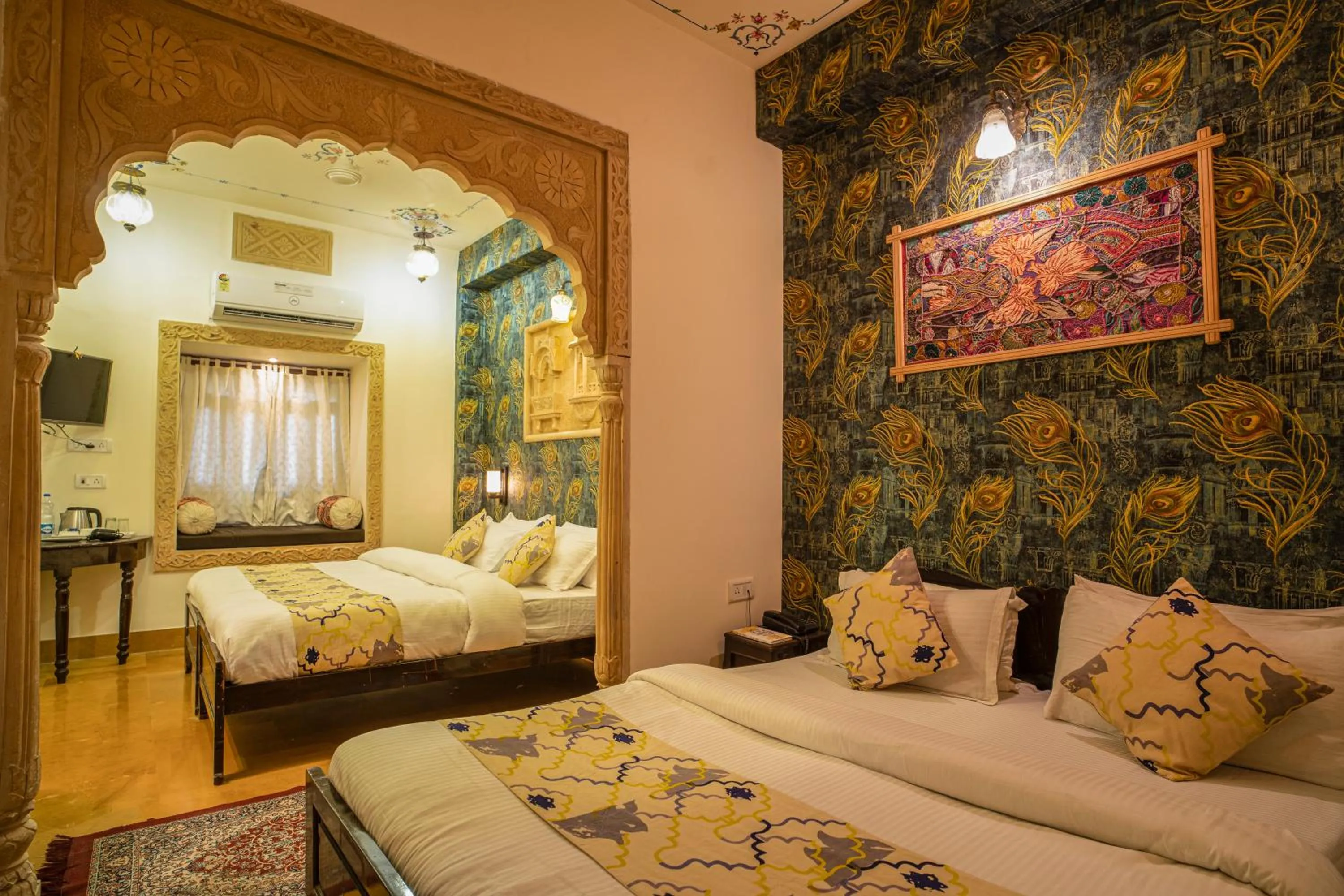 Bed in Tripli Hotels Prithvi Palace
