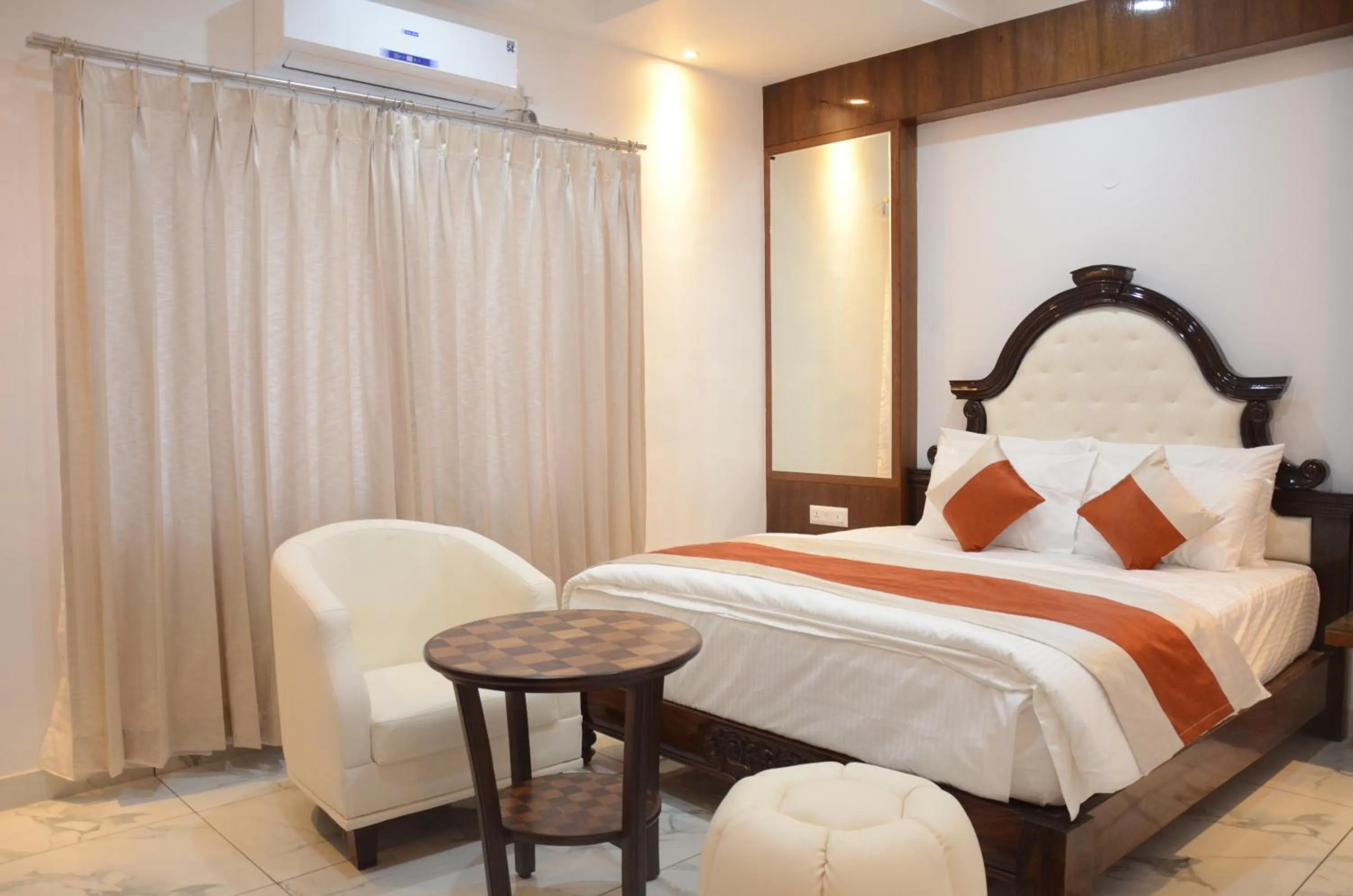 Bed in Hotel Lok Sagar Mysore