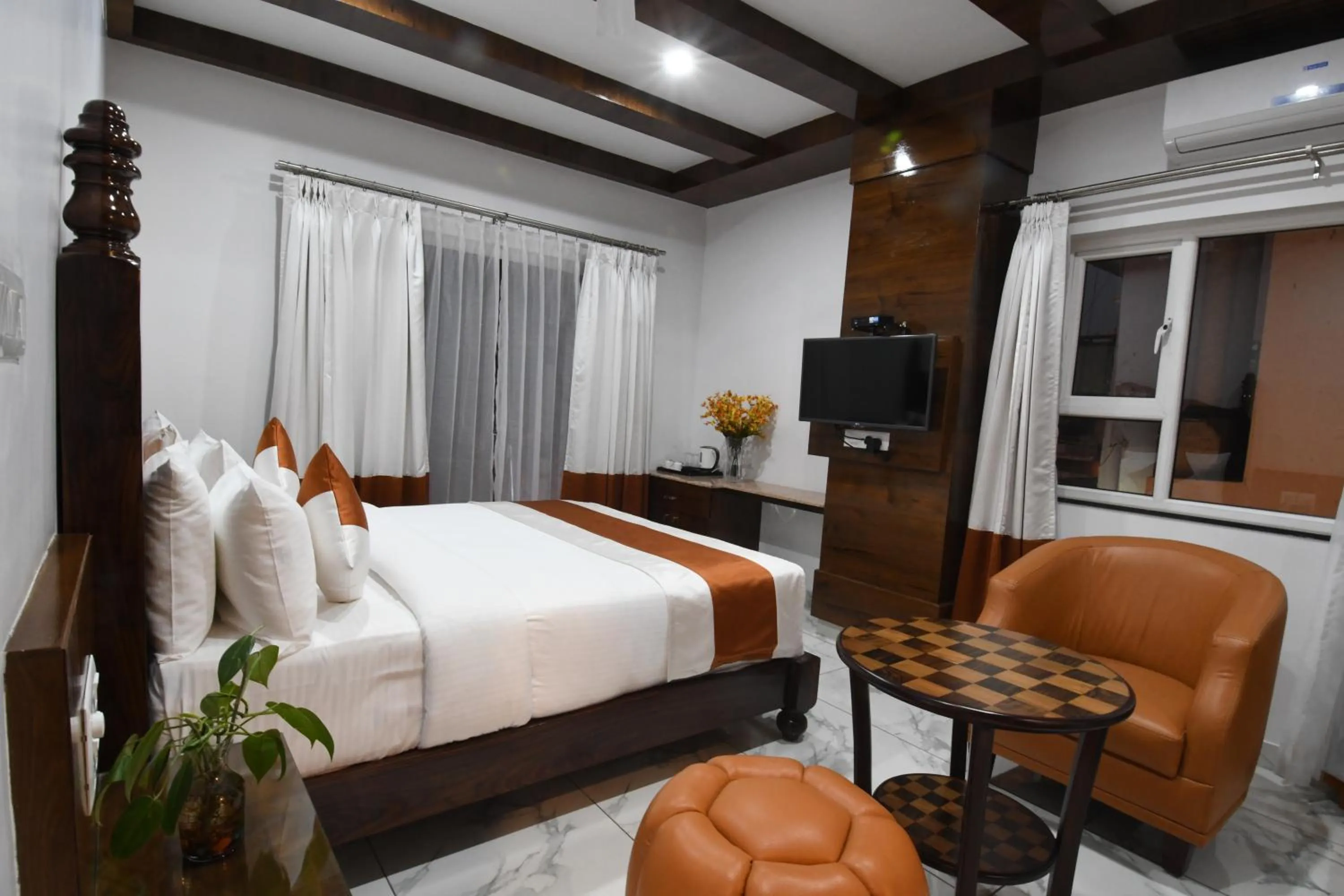 Seating area, Bed in Hotel Lok Sagar Mysore