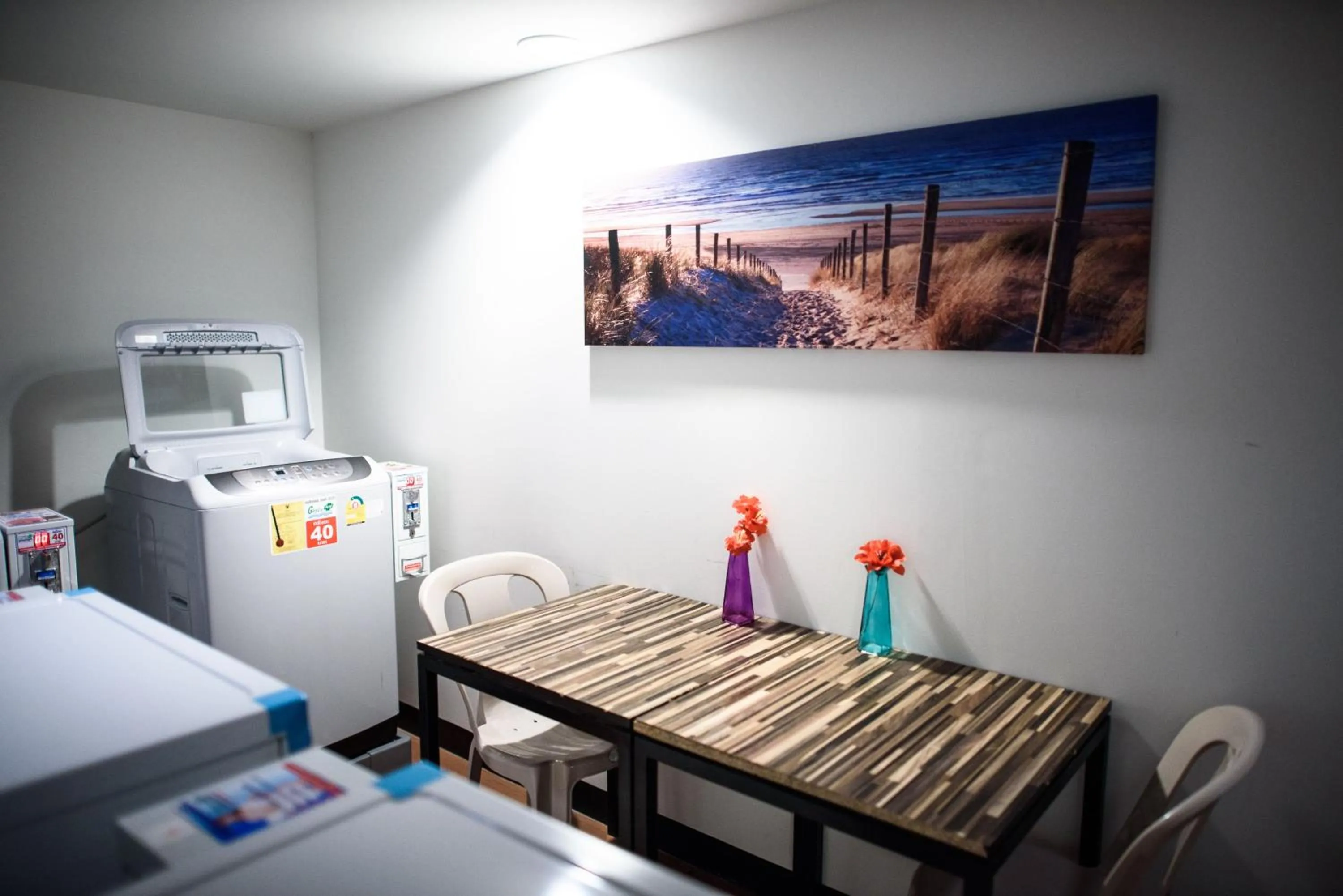 Communal lounge/ TV room in 48 Metro Hotel