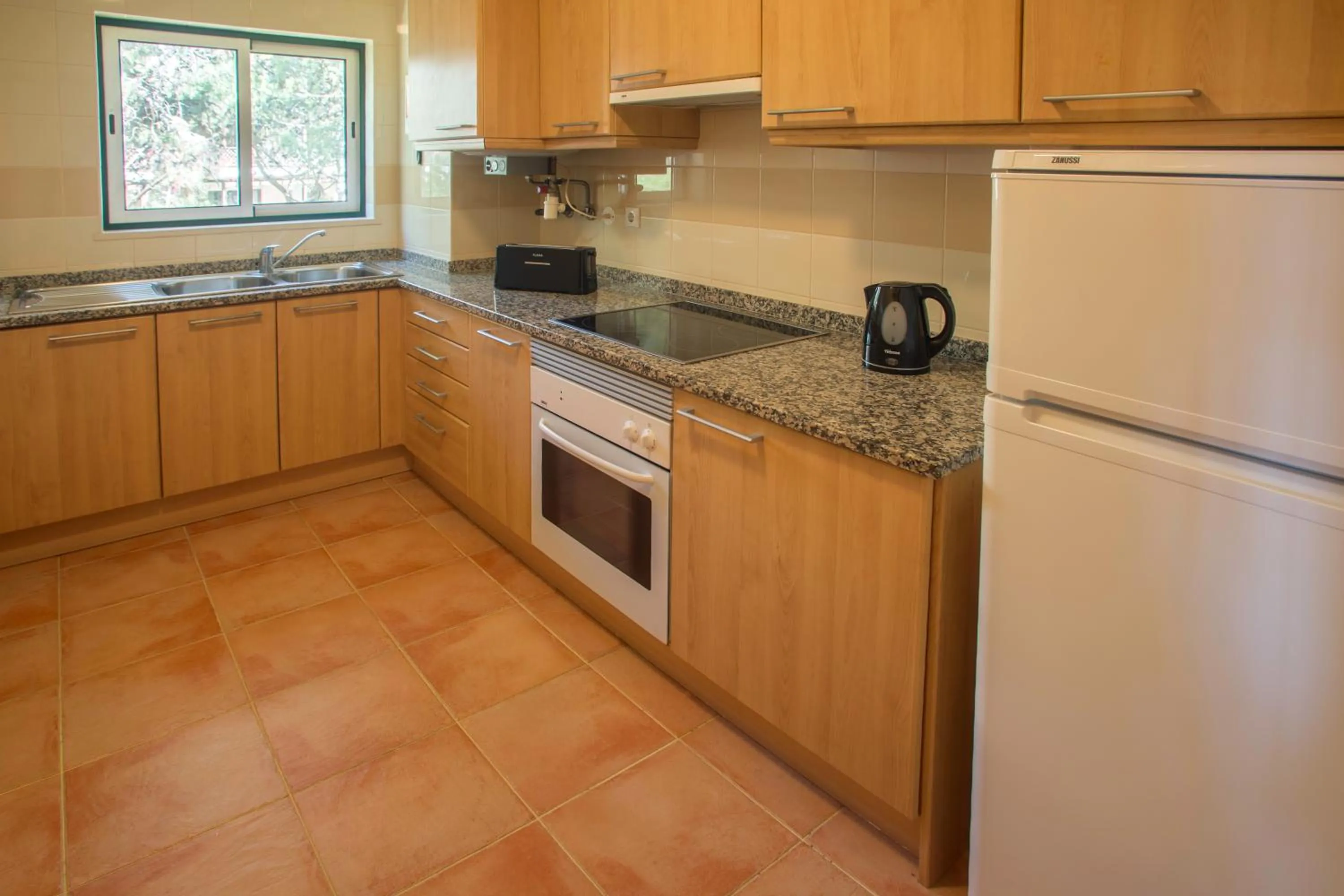Kitchen or kitchenette in AP Victoria Sports & Beach