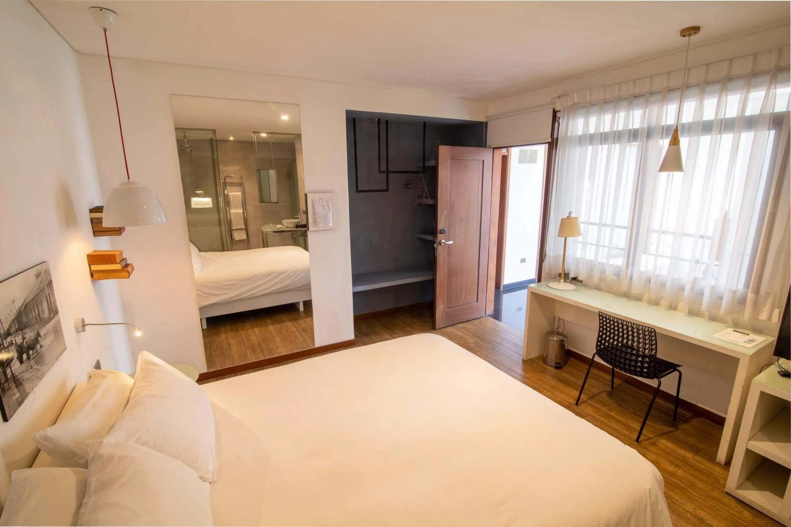 Photo of the whole room, Bed in Cosmopolitano Hotel Boutique