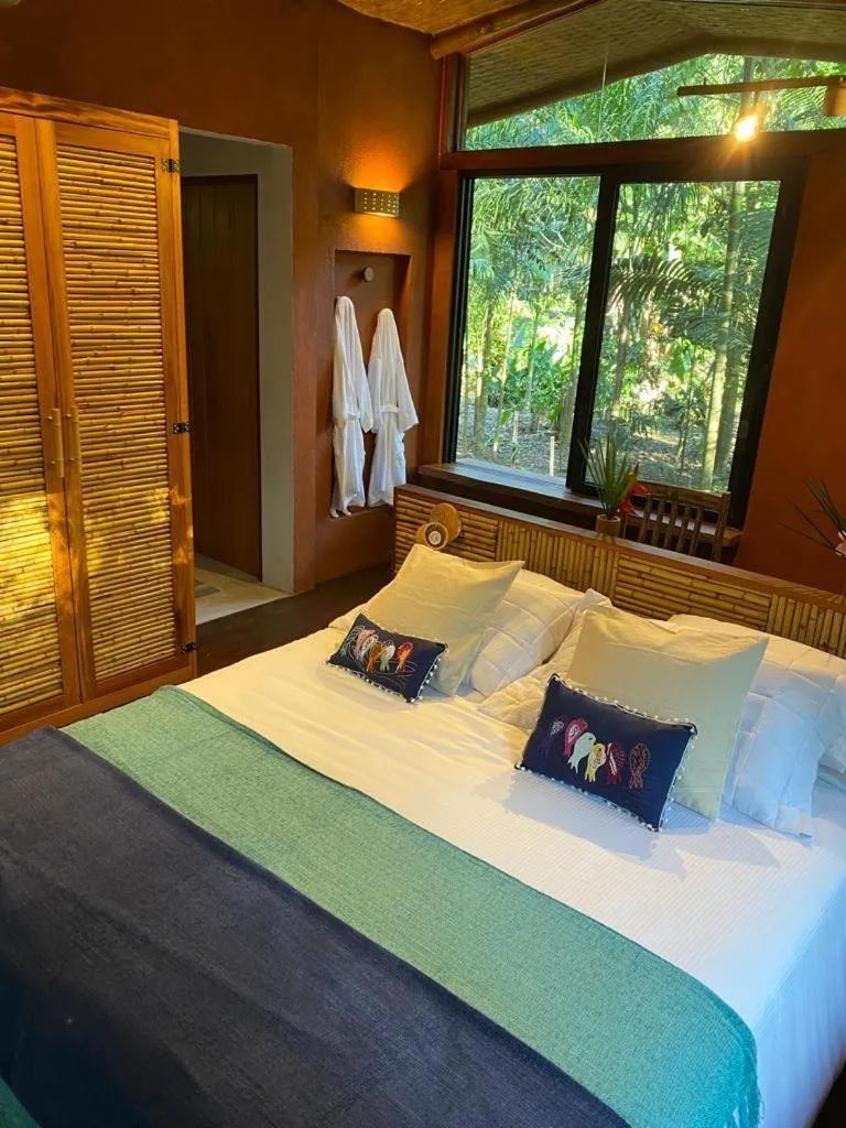 Photo of the whole room, Bed in Banana Bamboo Ecolodge