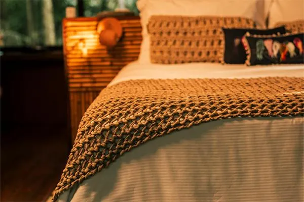 Bed in Banana Bamboo Ecolodge