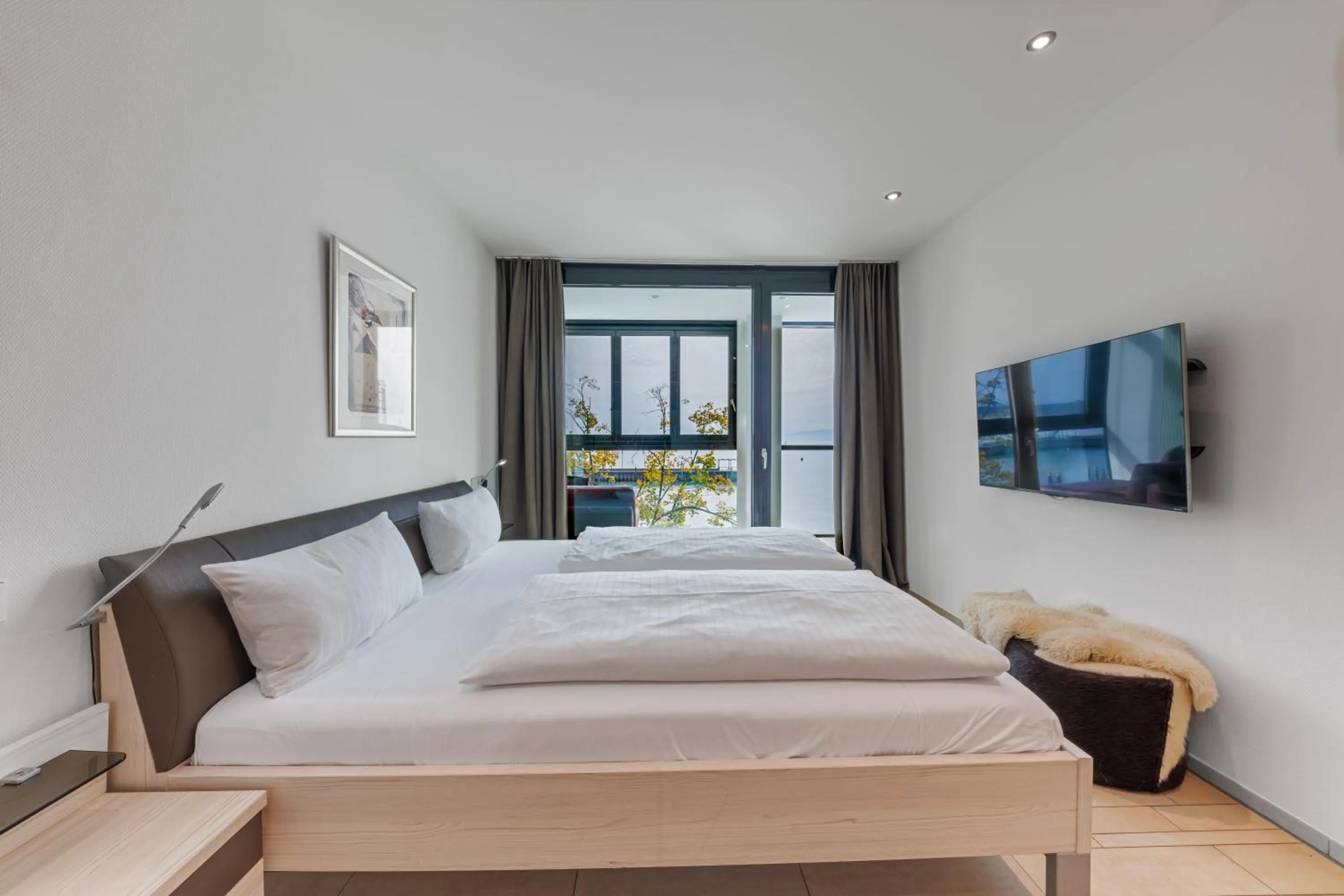 Bed in aika seaside living hotel