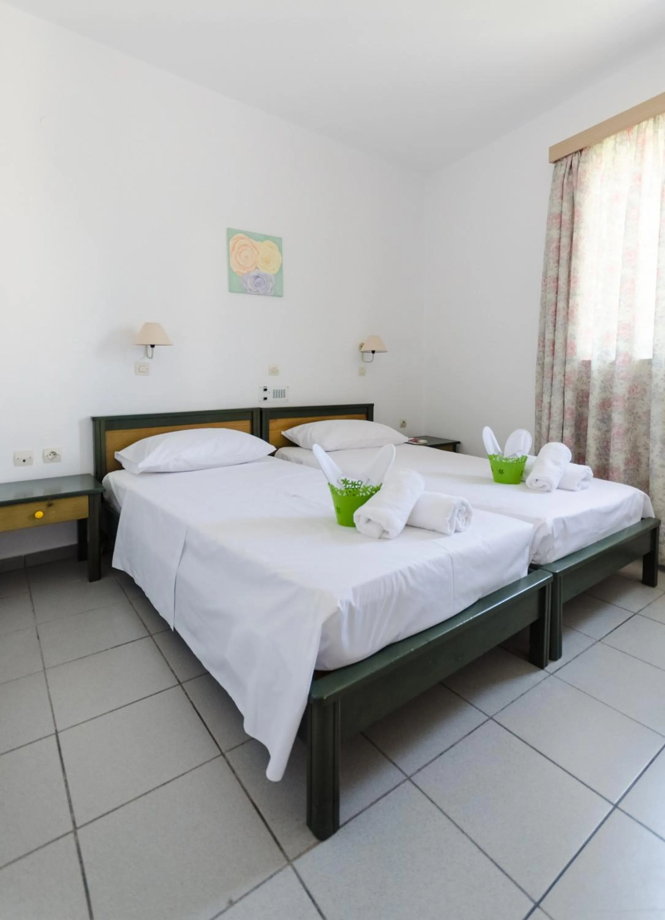 Bed in Happiness Apartments