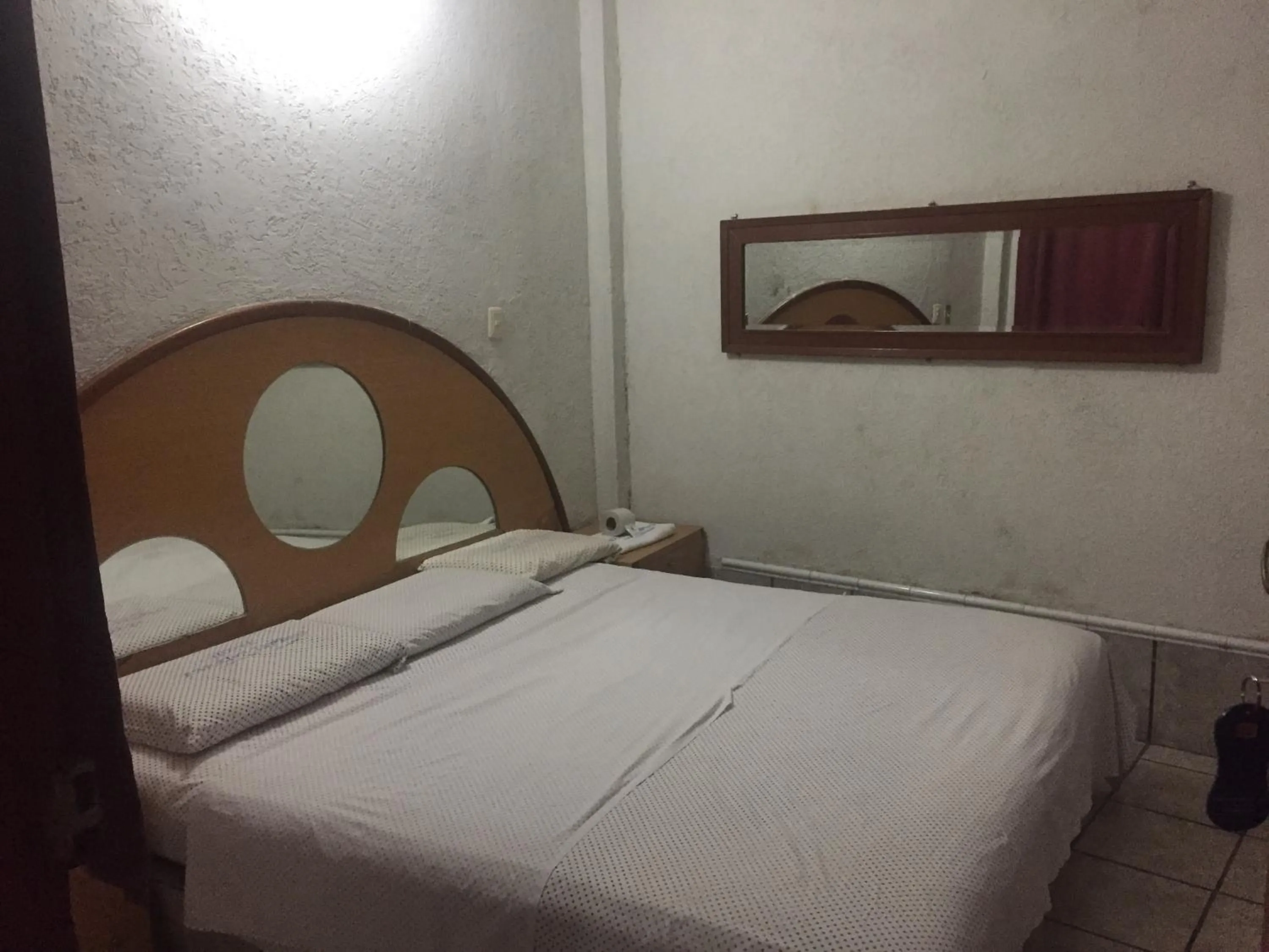 Decorative detail, Bed in Hotel Paraiso Express